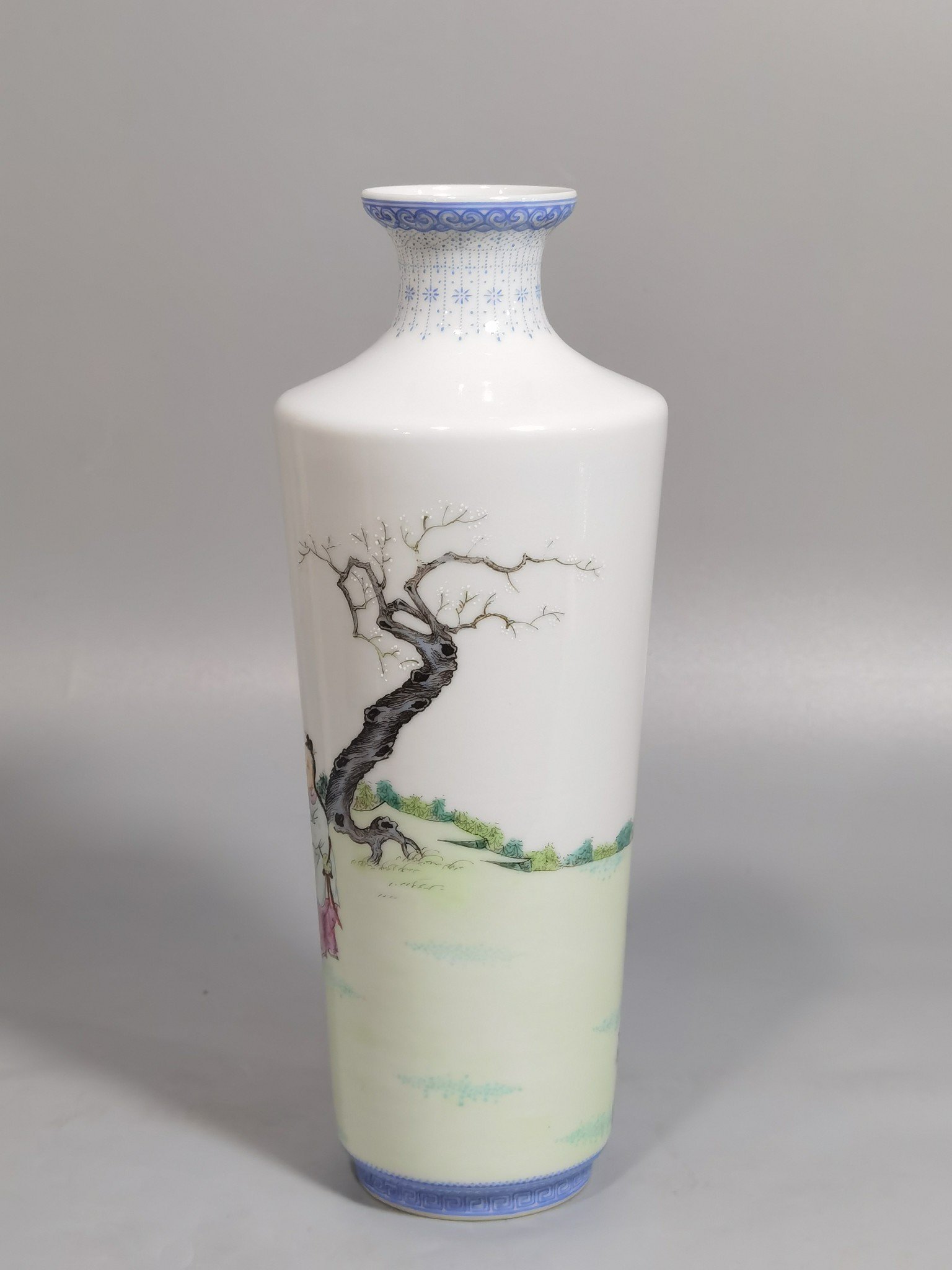 Qing Dynasty Qianlong green upper and lower edges pair of pastel boy vases