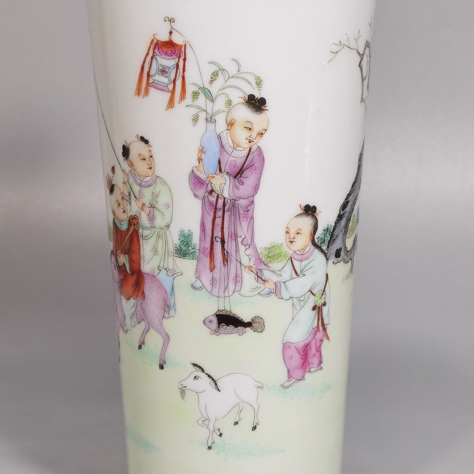 Qing Dynasty Qianlong green upper and lower edges pair of pastel boy vases