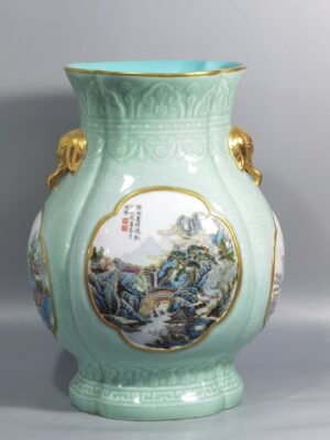 Qing Dynasty Qianlong pair of bean green glaze figures with elephant ears and begonia vases
