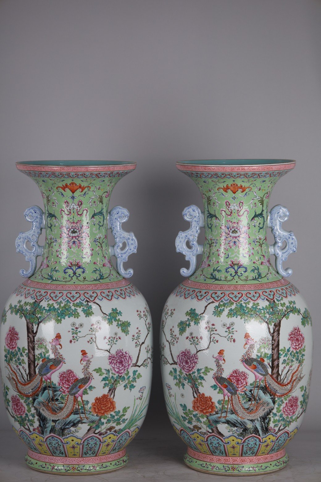 Qing Dynasty Qianlong pair of large phoenix peony amphorae with panoramic views of pastel vases