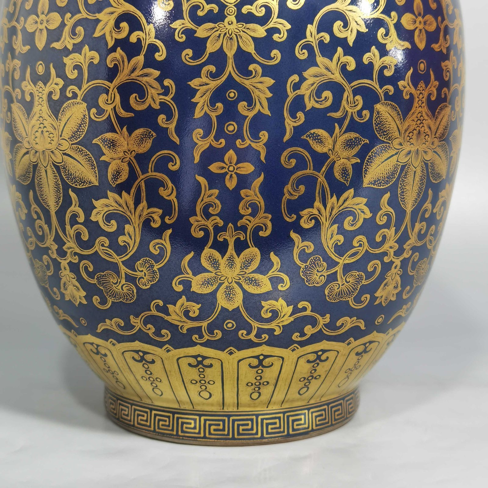 Qing Dynasty Qianlong blue-painted golden treasure pattern with double-dragon ear and mouth-shaped bottle
