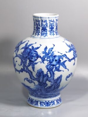 Qing Dynasty Qianlong blue and white five bats and nine peach pattern vase