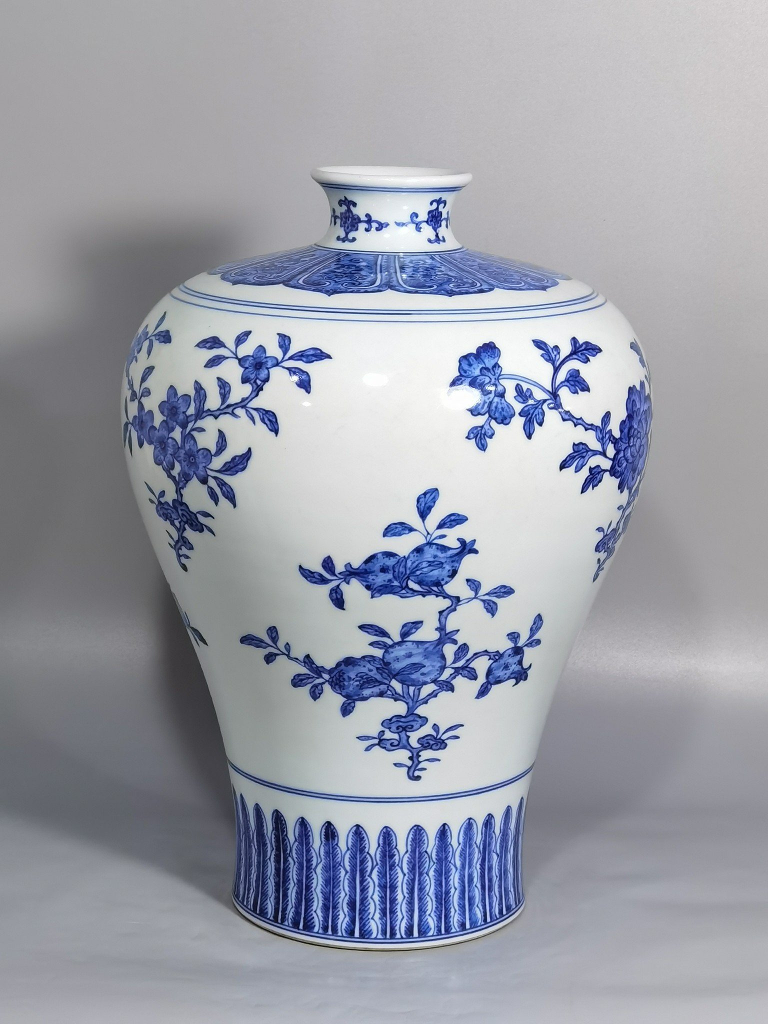Qing Dynasty Qianlong blue and white plum vase