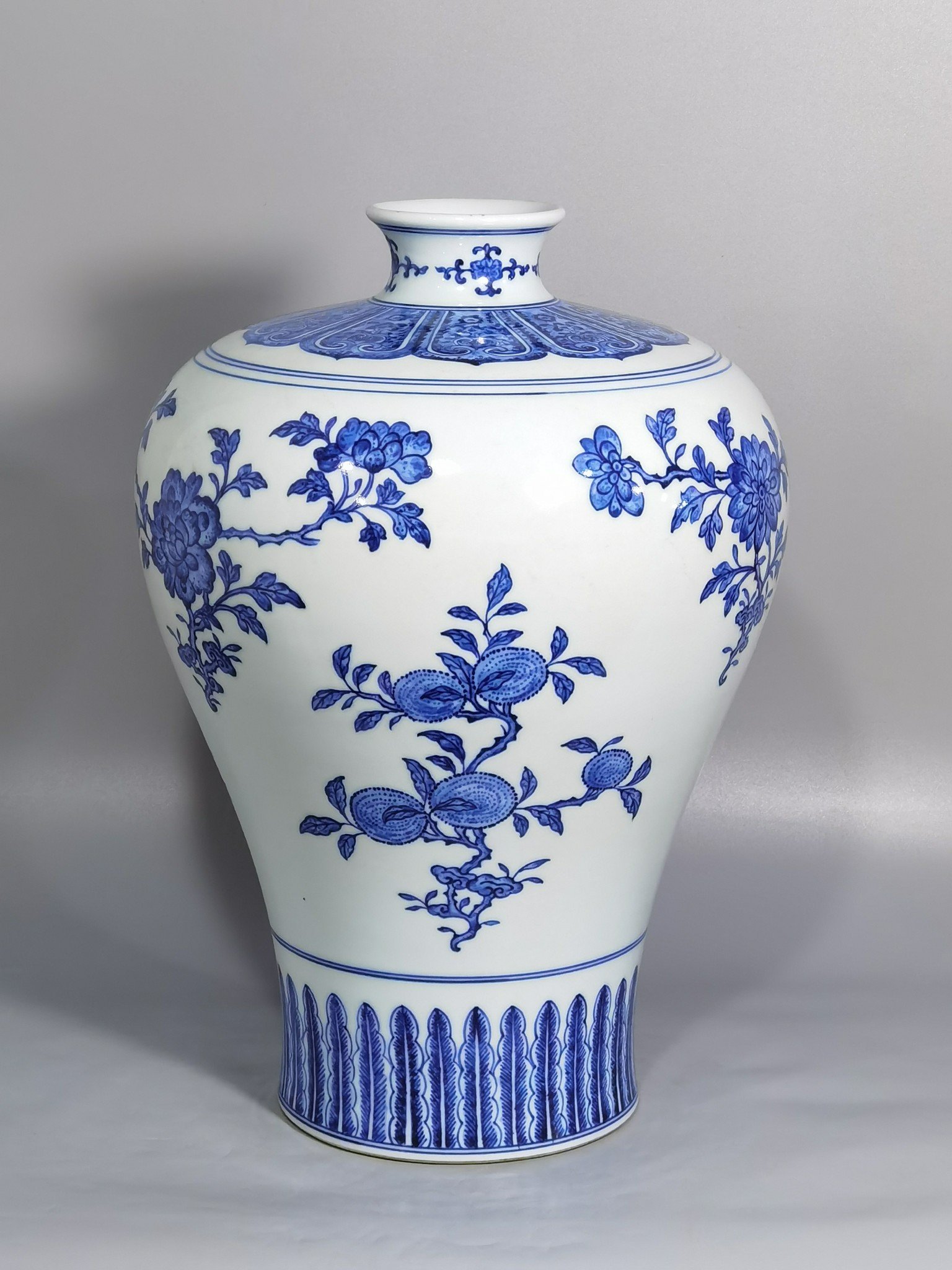 Qing Dynasty Qianlong blue and white plum vase