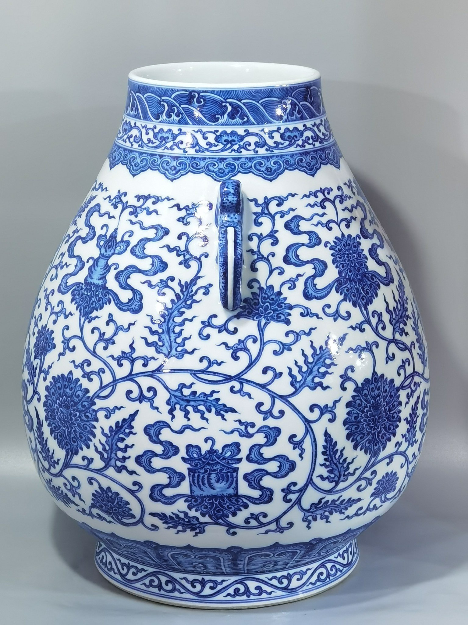 Qing Dynasty Qianlong blue and white entwined branches with eight treasures and lotus