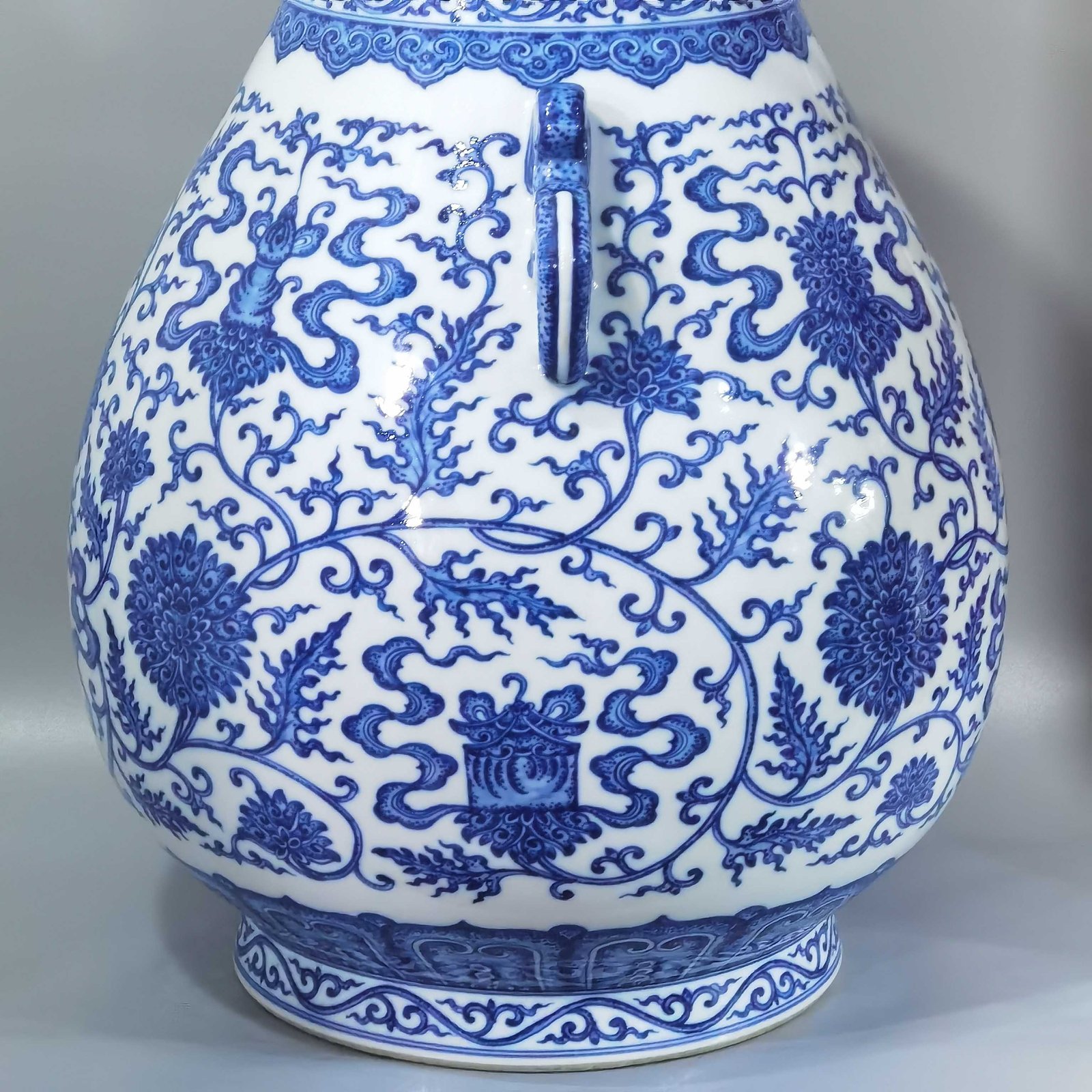 Qing Dynasty Qianlong blue and white entwined branches with eight treasures and lotus