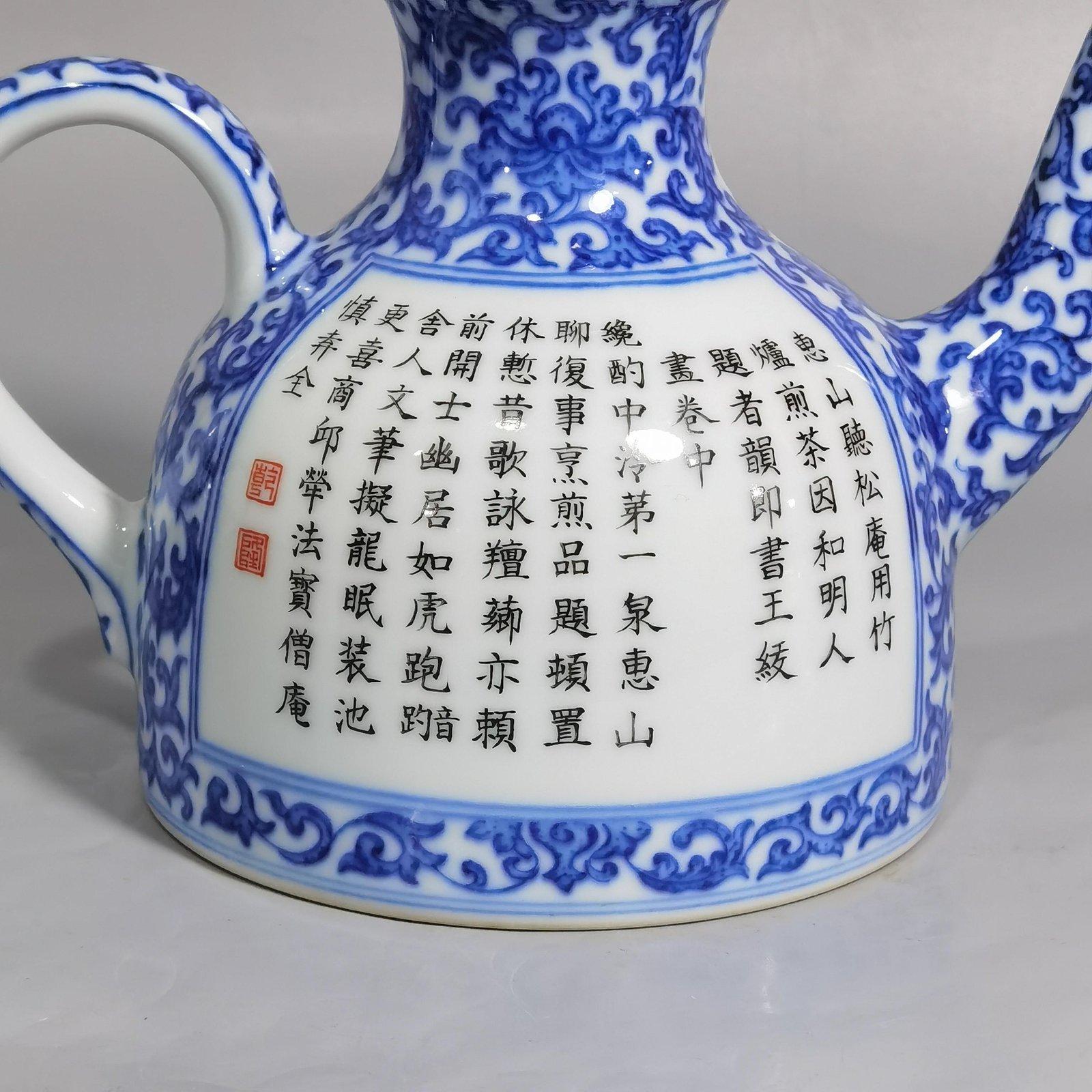 Qing Dynasty Qianlong blue and white intertwining ngustifolia figures poetry teapot