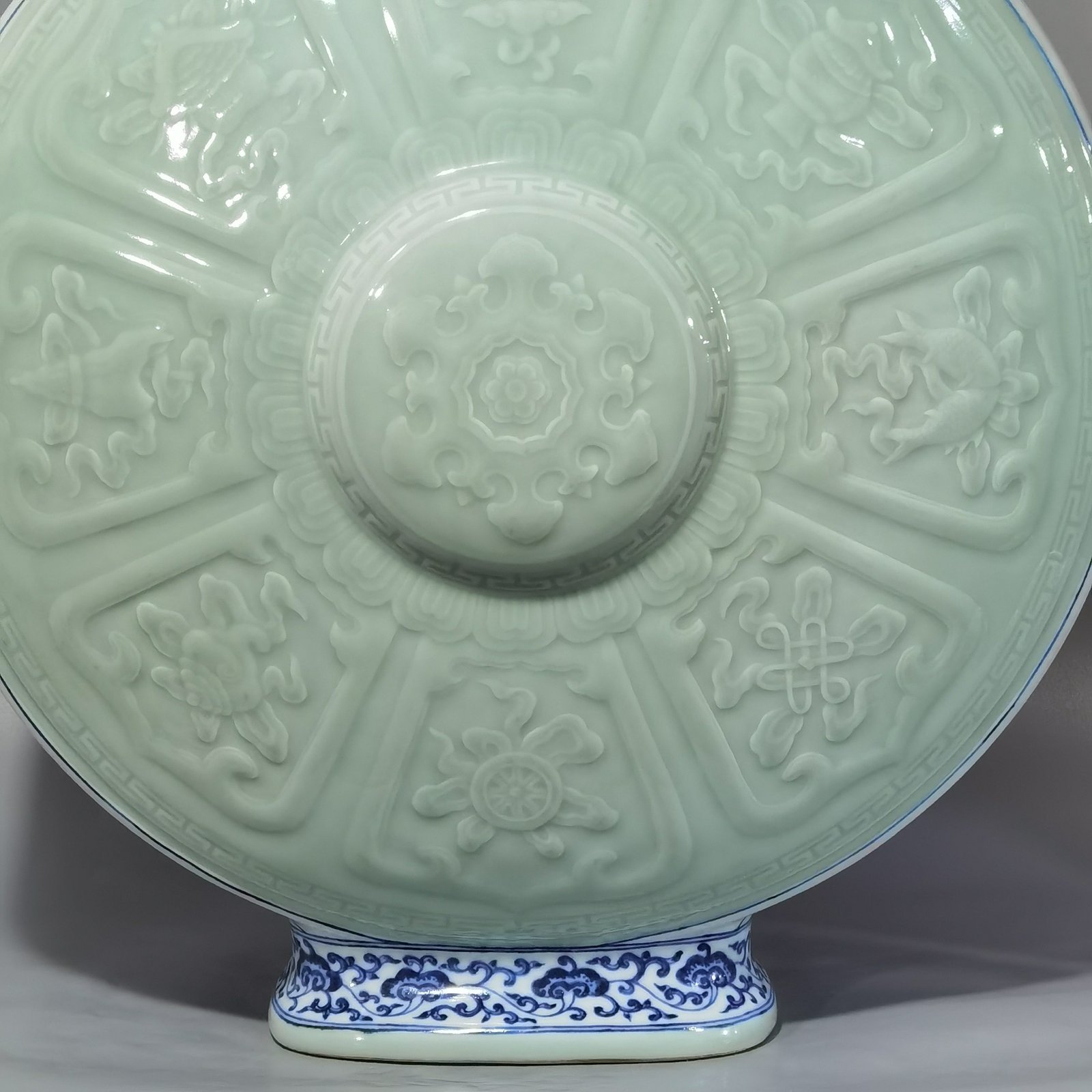 Qing Dynasty Qianlong blue and white lotus bean green glaze double ears and moon holding flat vase