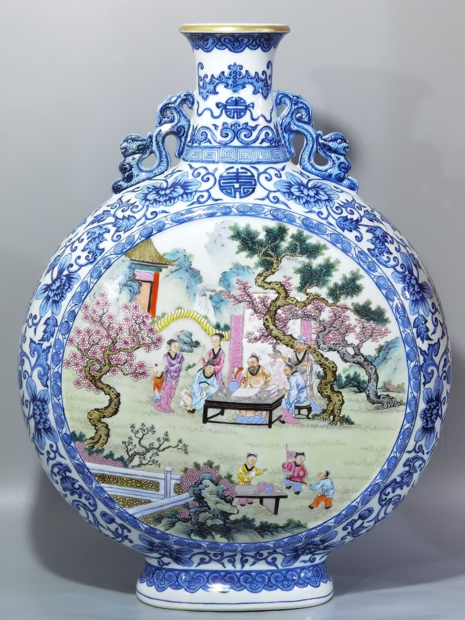 Qing Dynasty Qianlong blue and white intertwined branches elegant gathering of the West Garden flat vase