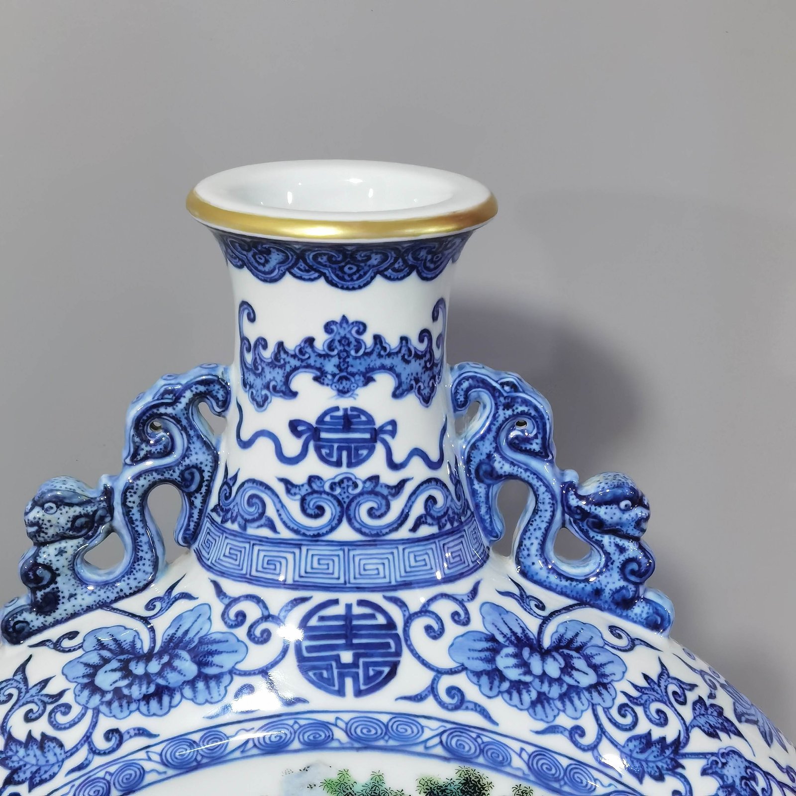Qing Dynasty Qianlong blue and white intertwined branches elegant gathering of the West Garden flat vase