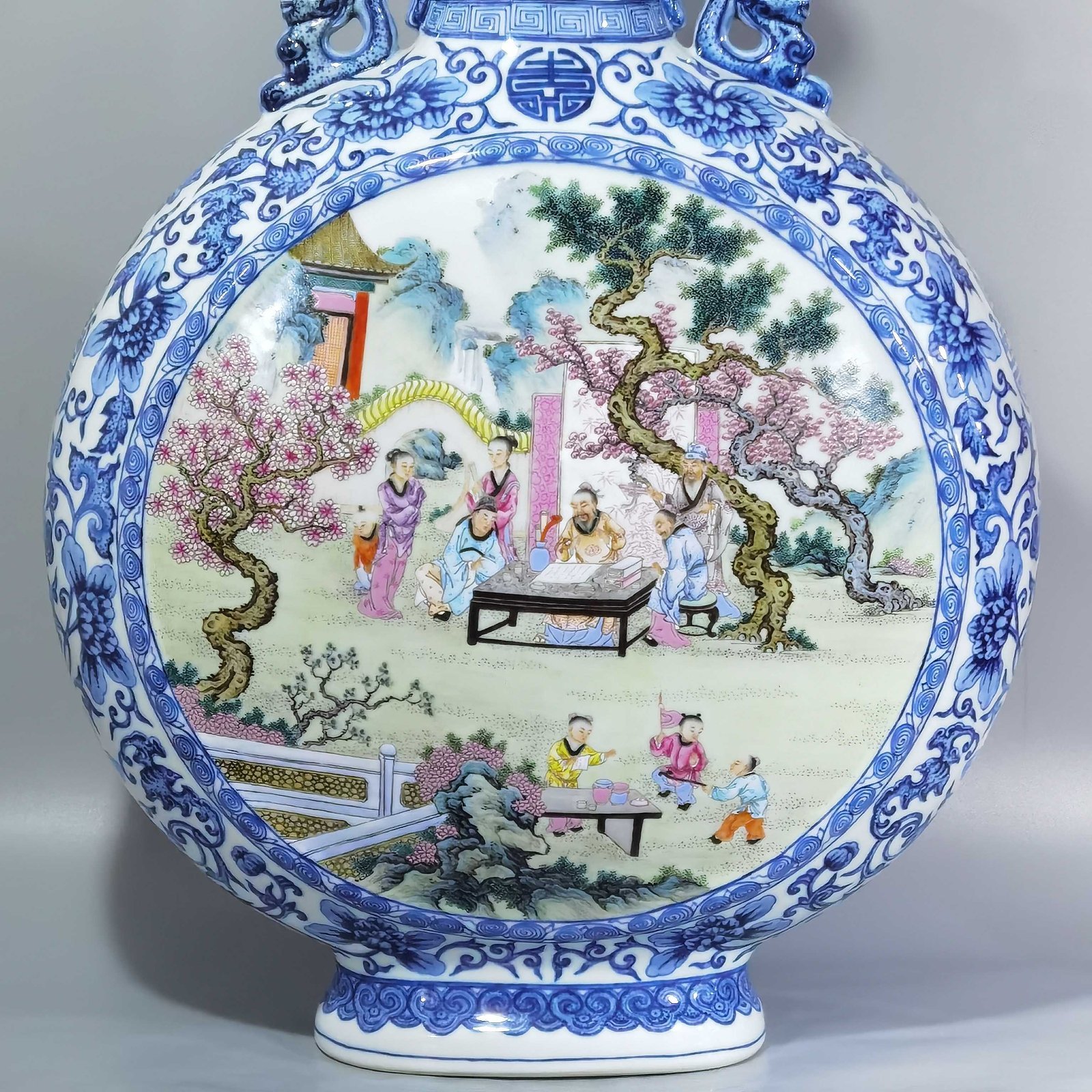 Qing Dynasty Qianlong blue and white intertwined branches elegant gathering of the West Garden flat vase