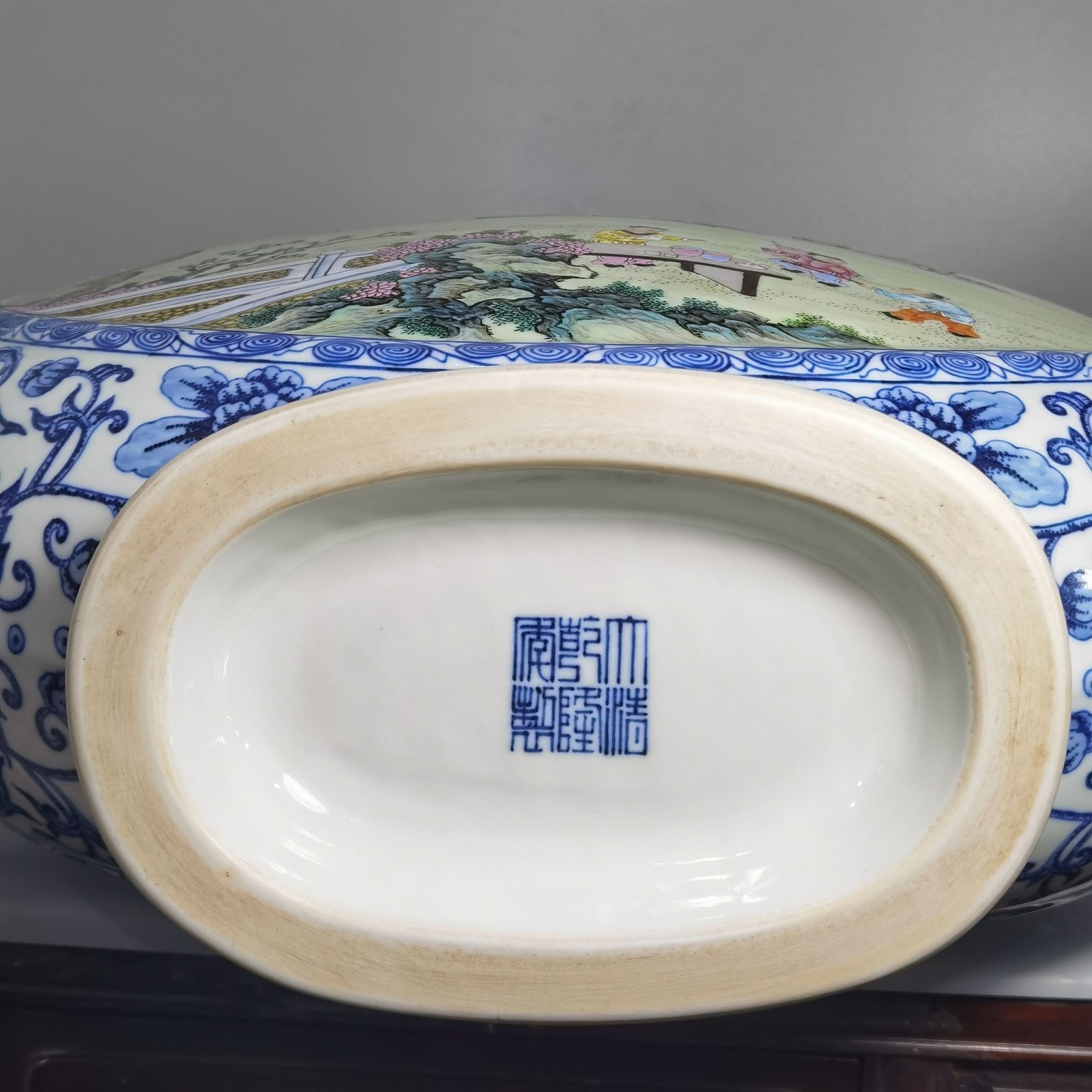 Qing Dynasty Qianlong blue and white intertwined branches elegant gathering of the West Garden flat vase