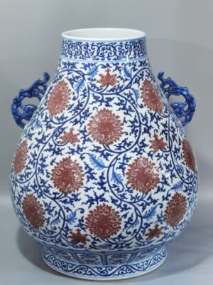 Qing Dynasty Qianlong blue and white glazed red lotus pattern Ruyi ear blessing barrel