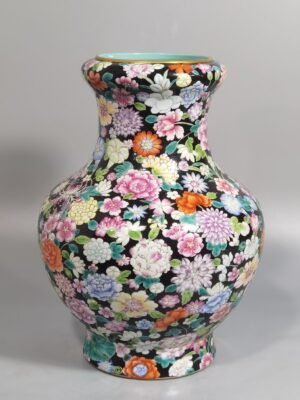 Qing Dynasty Qianlong black ground pastel colored mouth-washing bottle