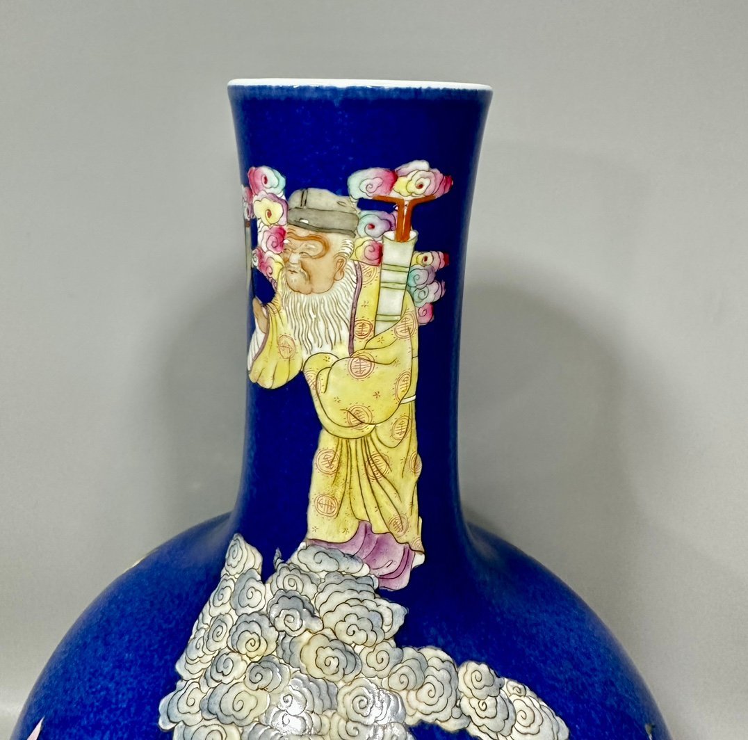 Qing Dynasty Qianlong famille rose and blue-glazed celestial sphere vase