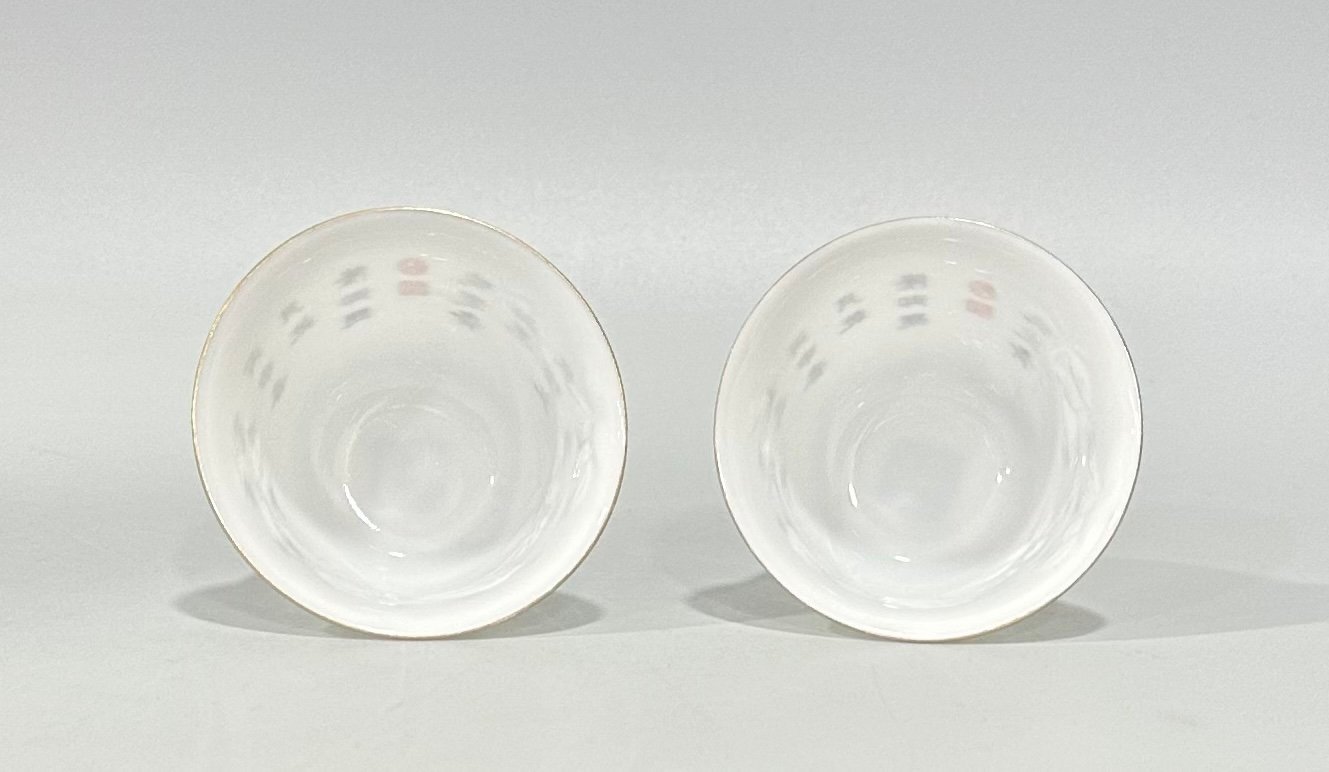 Qing Dynasty Qianlong thin cup engraved with flowers