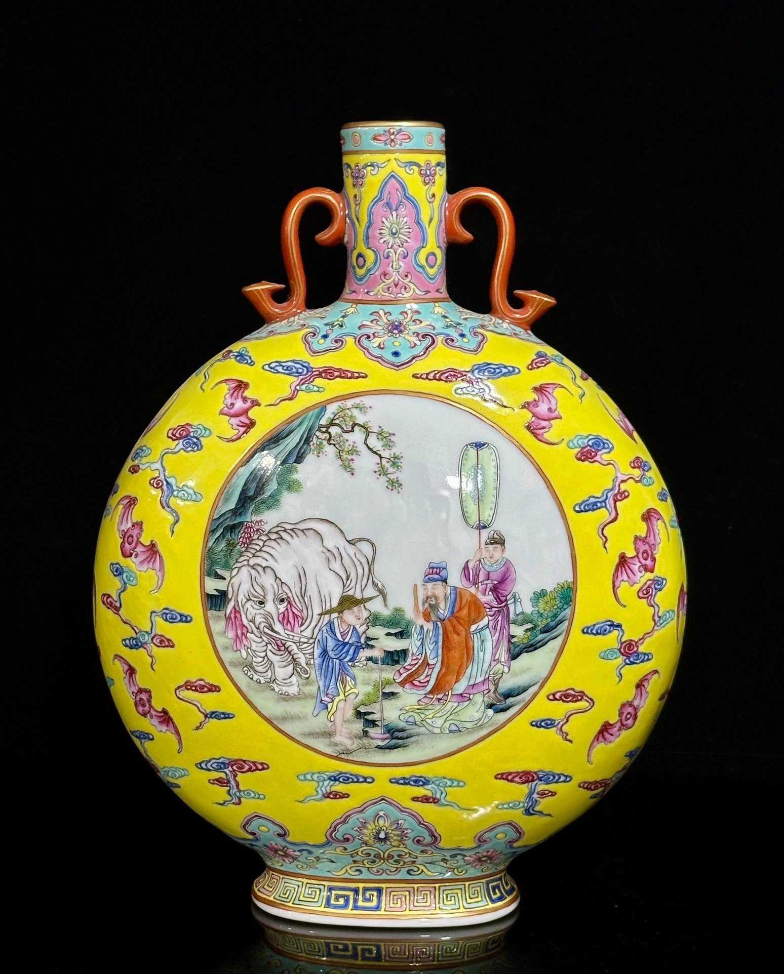 Qing Dynasty Qianlong lemon yellow glazed cloud bat window double-eared moon vase