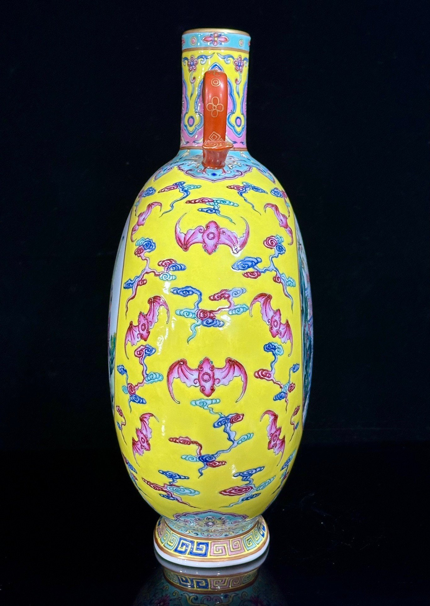 Qing Dynasty Qianlong lemon yellow glazed cloud bat window double-eared moon vase