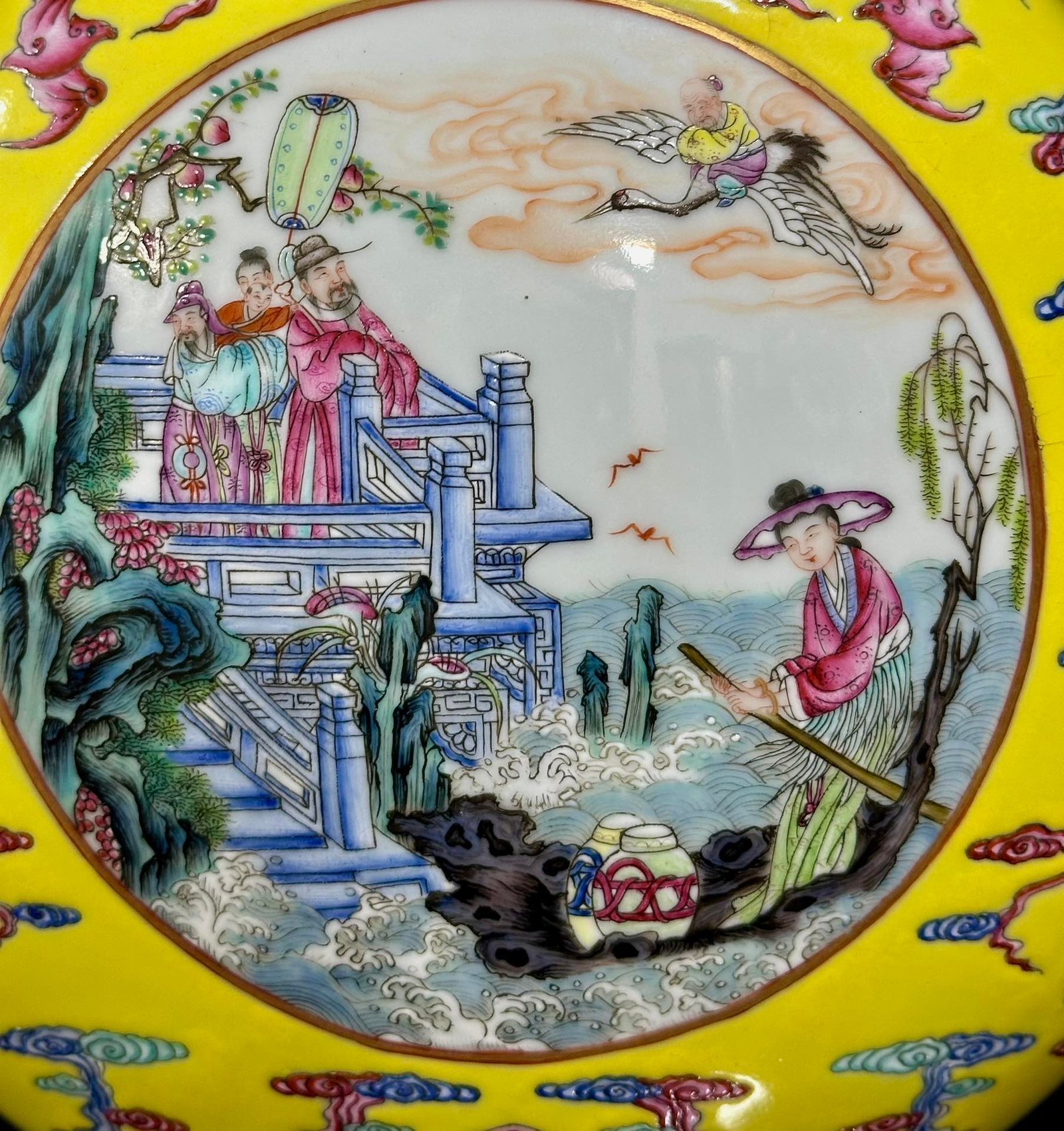 Qing Dynasty Qianlong lemon yellow glazed cloud bat window double-eared moon vase