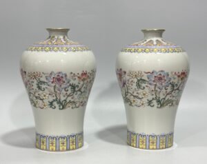 Qing Dynasty Qianlong Yangcai plum vase with passion flower
