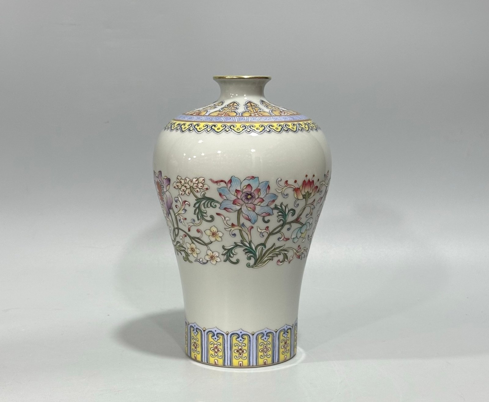 Qing Dynasty Qianlong Yangcai plum vase with passion flower