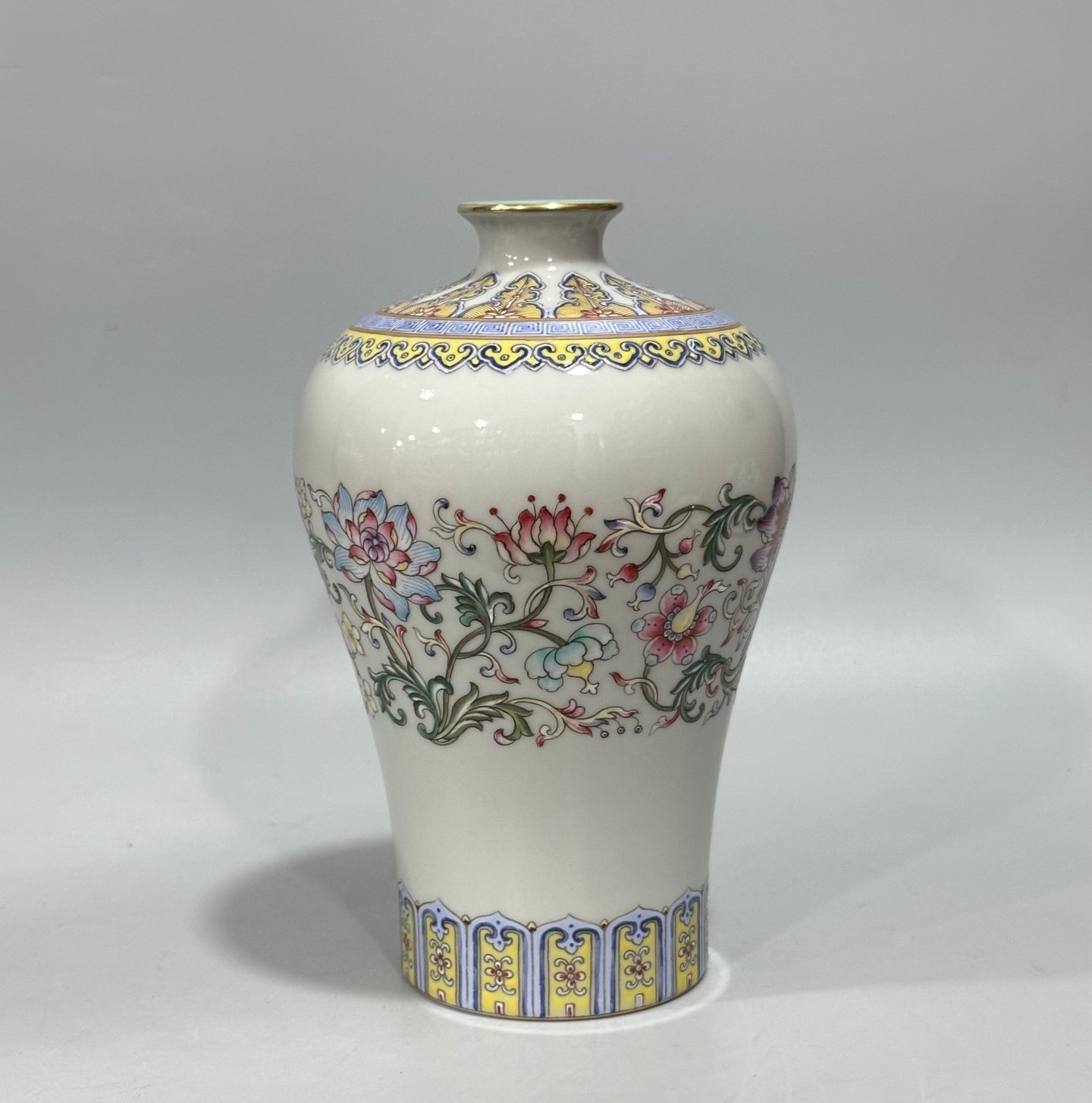 Qing Dynasty Qianlong Yangcai plum vase with passion flower