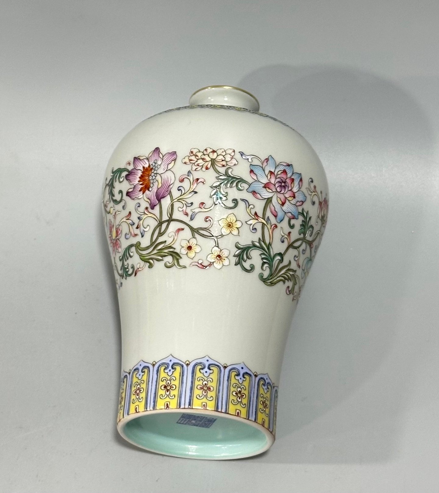 Qing Dynasty Qianlong Yangcai plum vase with passion flower