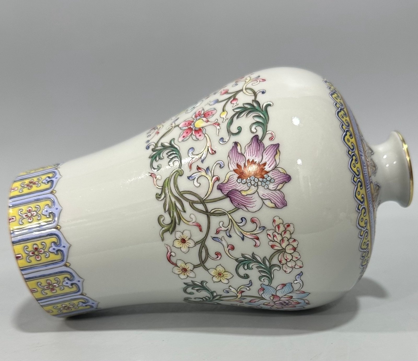 Qing Dynasty Qianlong Yangcai plum vase with passion flower