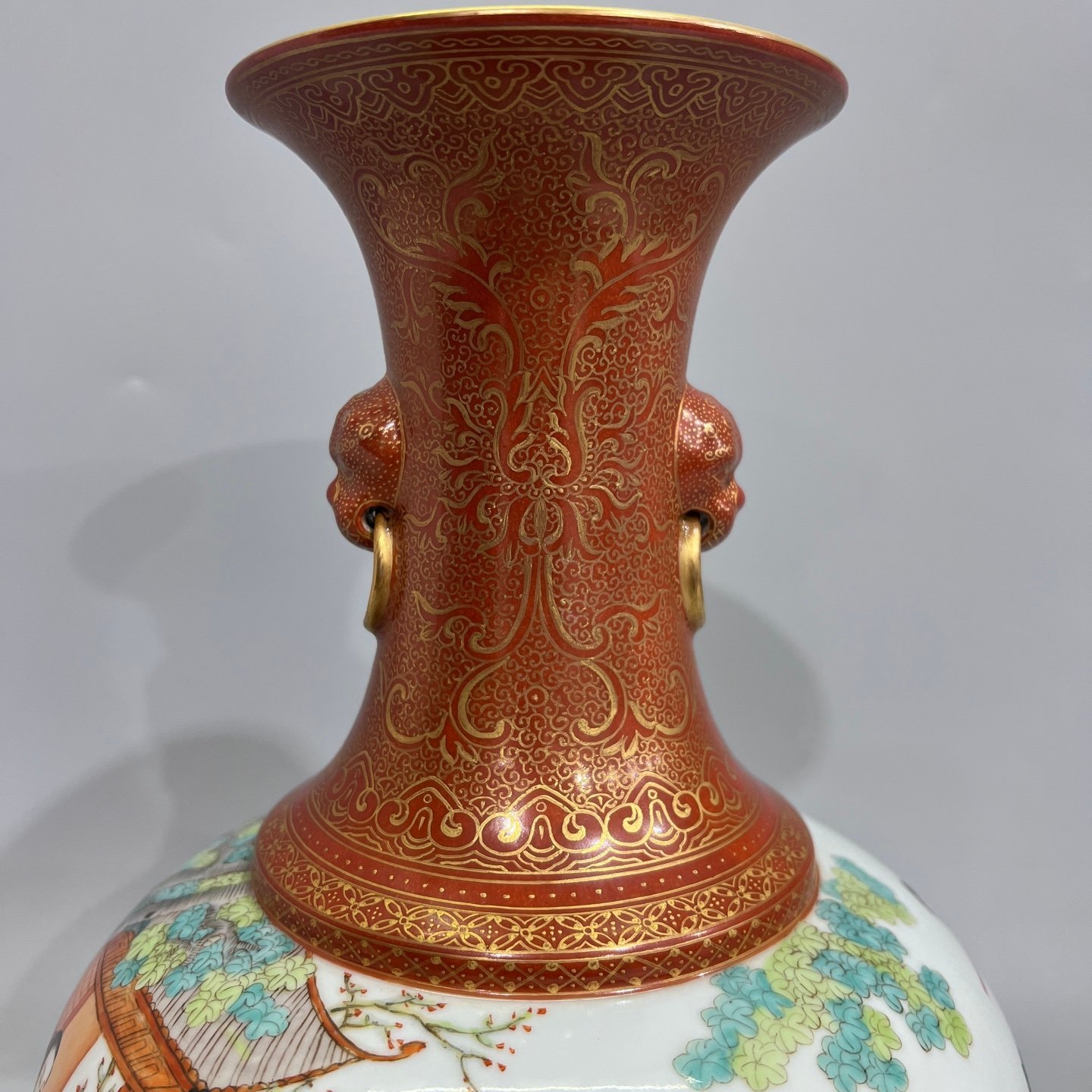 Qing Dynasty alum red gilt on top and bottom and pastel figures pair of two-ear vase
