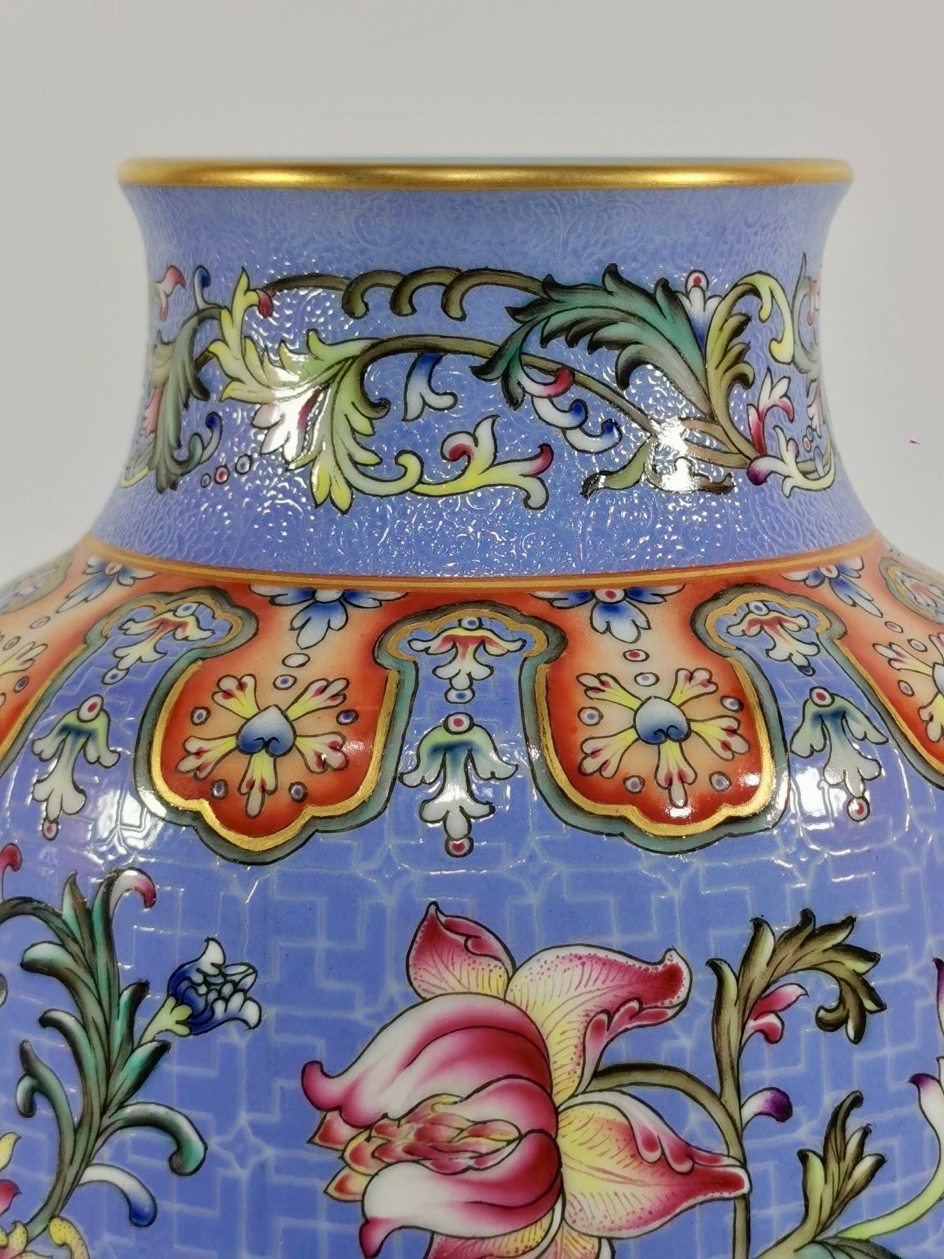 Qing Dynasty Qianlong a blue-ground pastel-painted gilt-painted winter melon vase