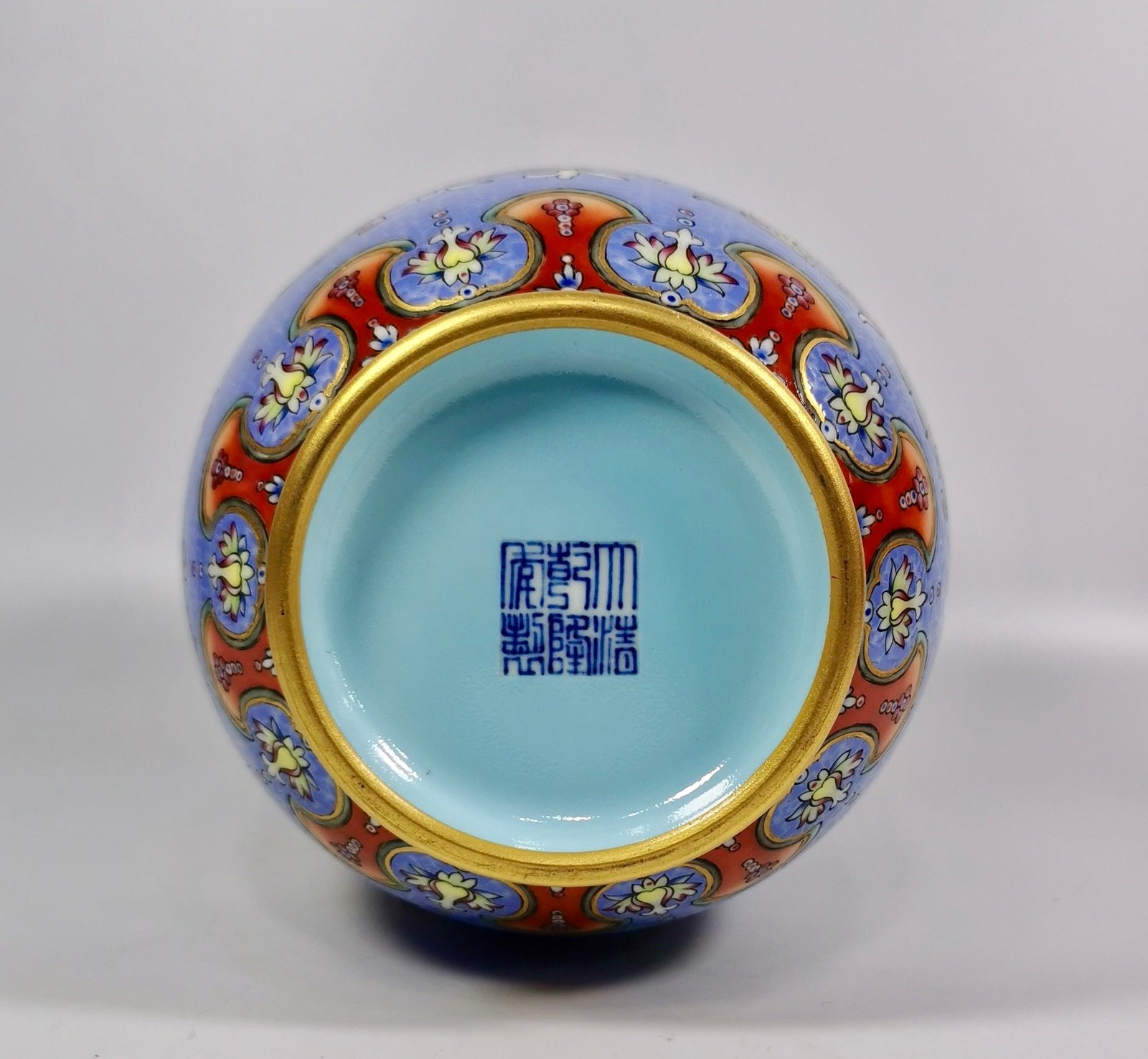 Qing Dynasty Qianlong a blue-ground pastel-painted gilt-painted winter melon vase