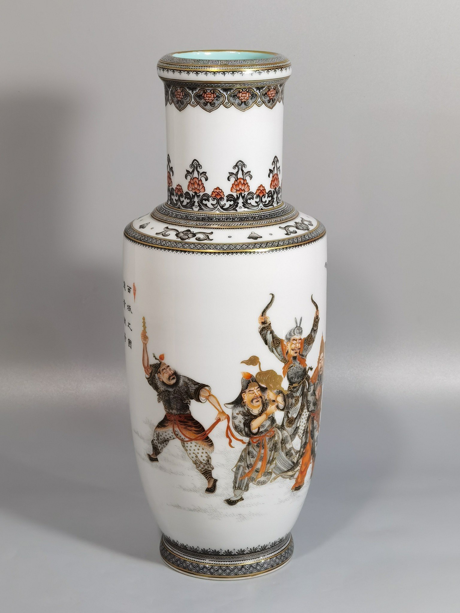 Qing Dynasty Qianlong decorated with ink and painted with gold eight barbarians vase