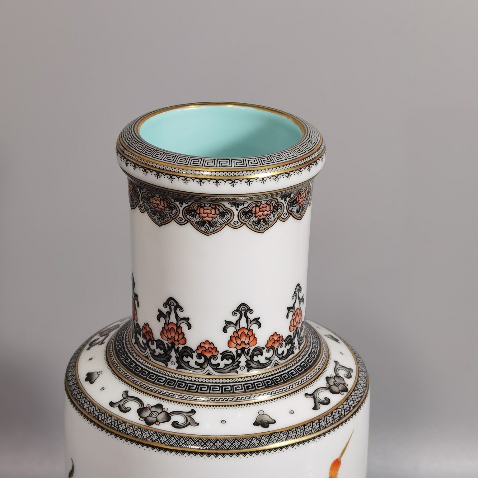 Qing Dynasty Qianlong decorated with ink and painted with gold eight barbarians vase