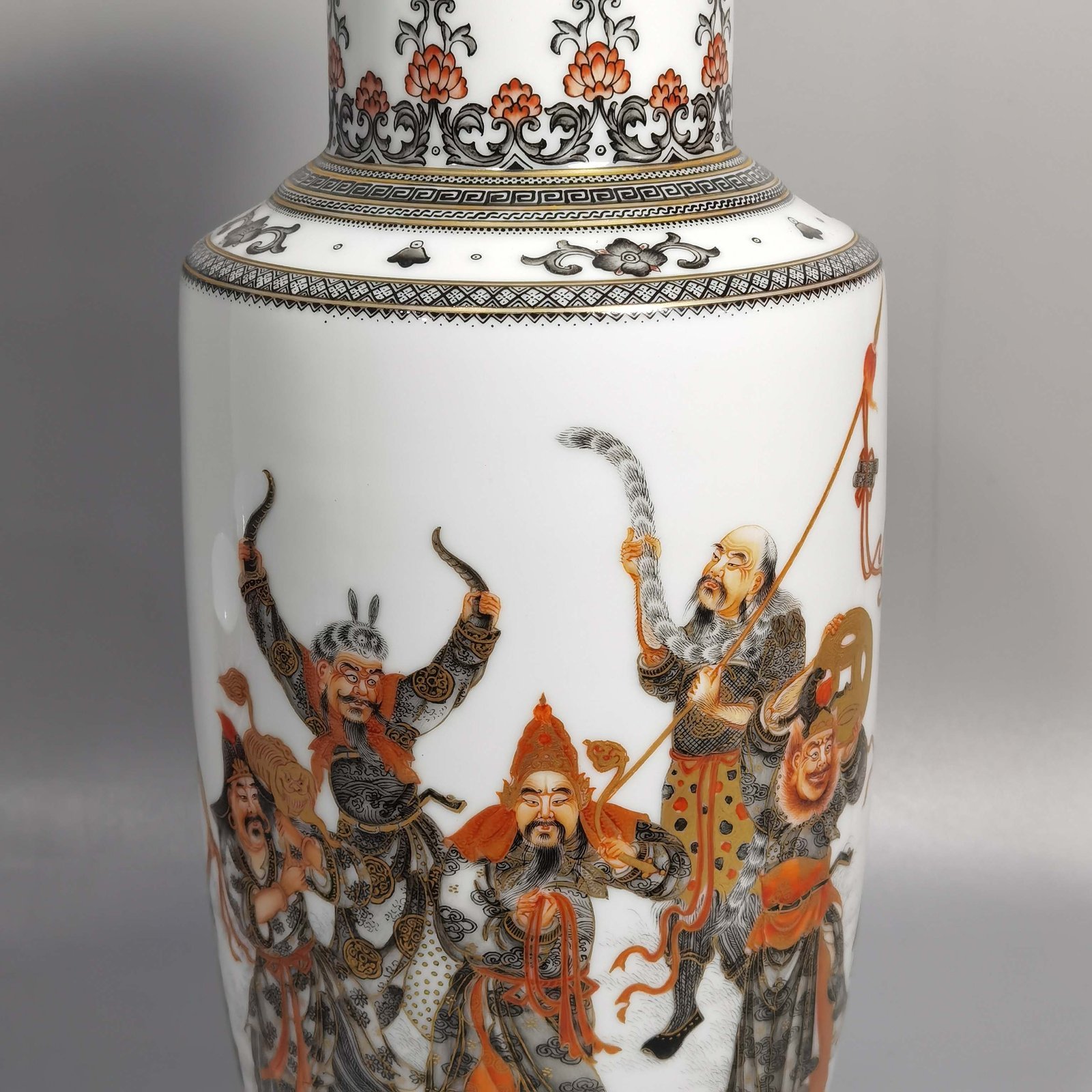 Qing Dynasty Qianlong decorated with ink and painted with gold eight barbarians vase