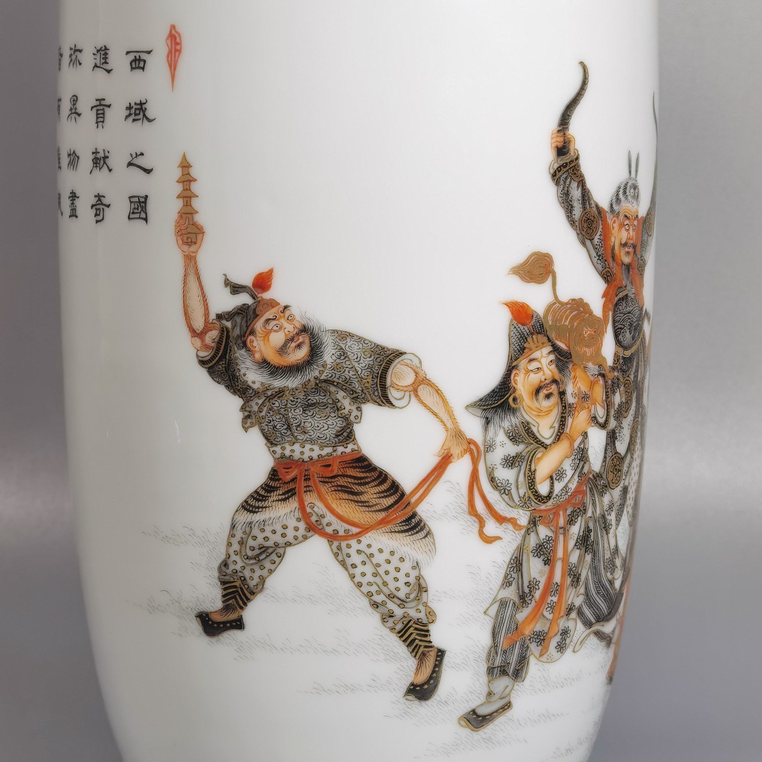 Qing Dynasty Qianlong decorated with ink and painted with gold eight barbarians vase