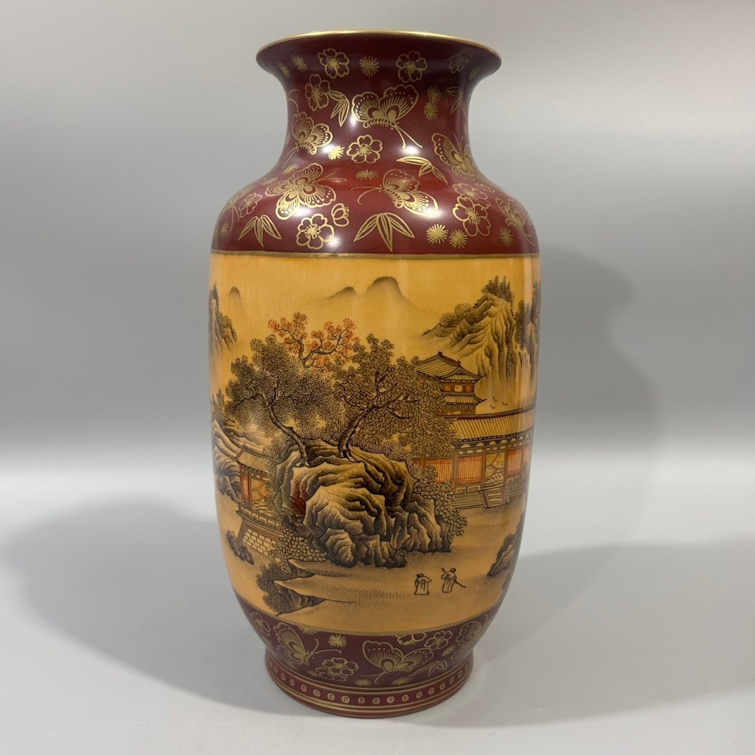 Qing Dynasty Qianlong wood grain ink color landscape winter melon vase