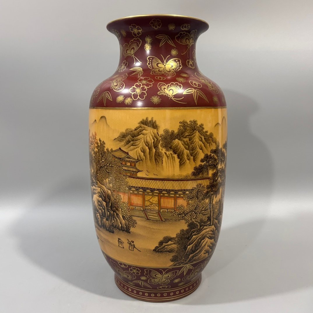 Qing Dynasty Qianlong wood grain ink color landscape winter melon vase