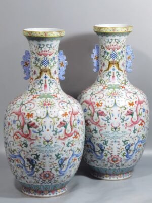Qing Dynasty Qianlong Yangcai Fushou double red dragon pierced flower amphorae