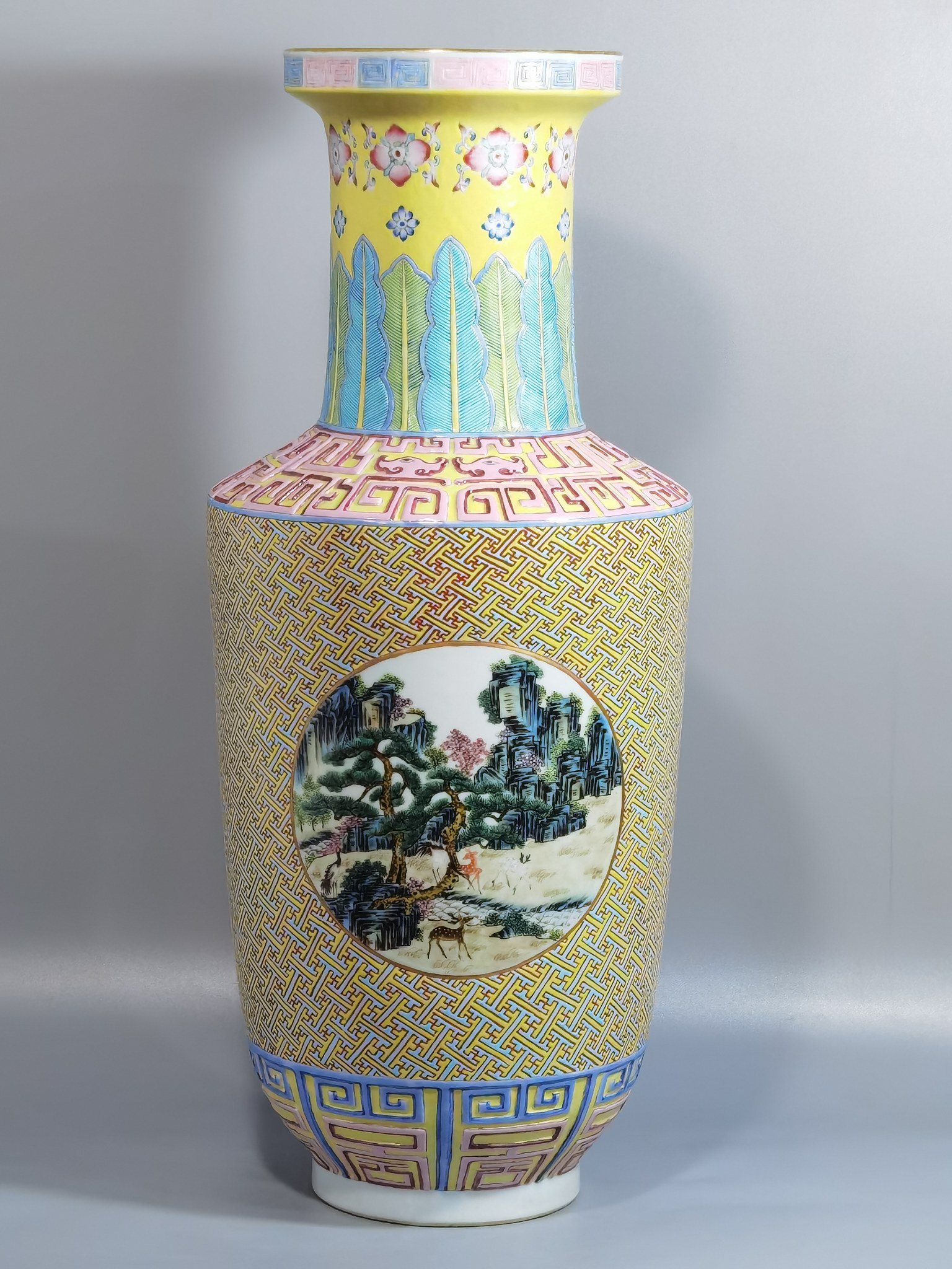 Qing Dynasty Qianlong pastel windowed deer and crane with spring stick vase