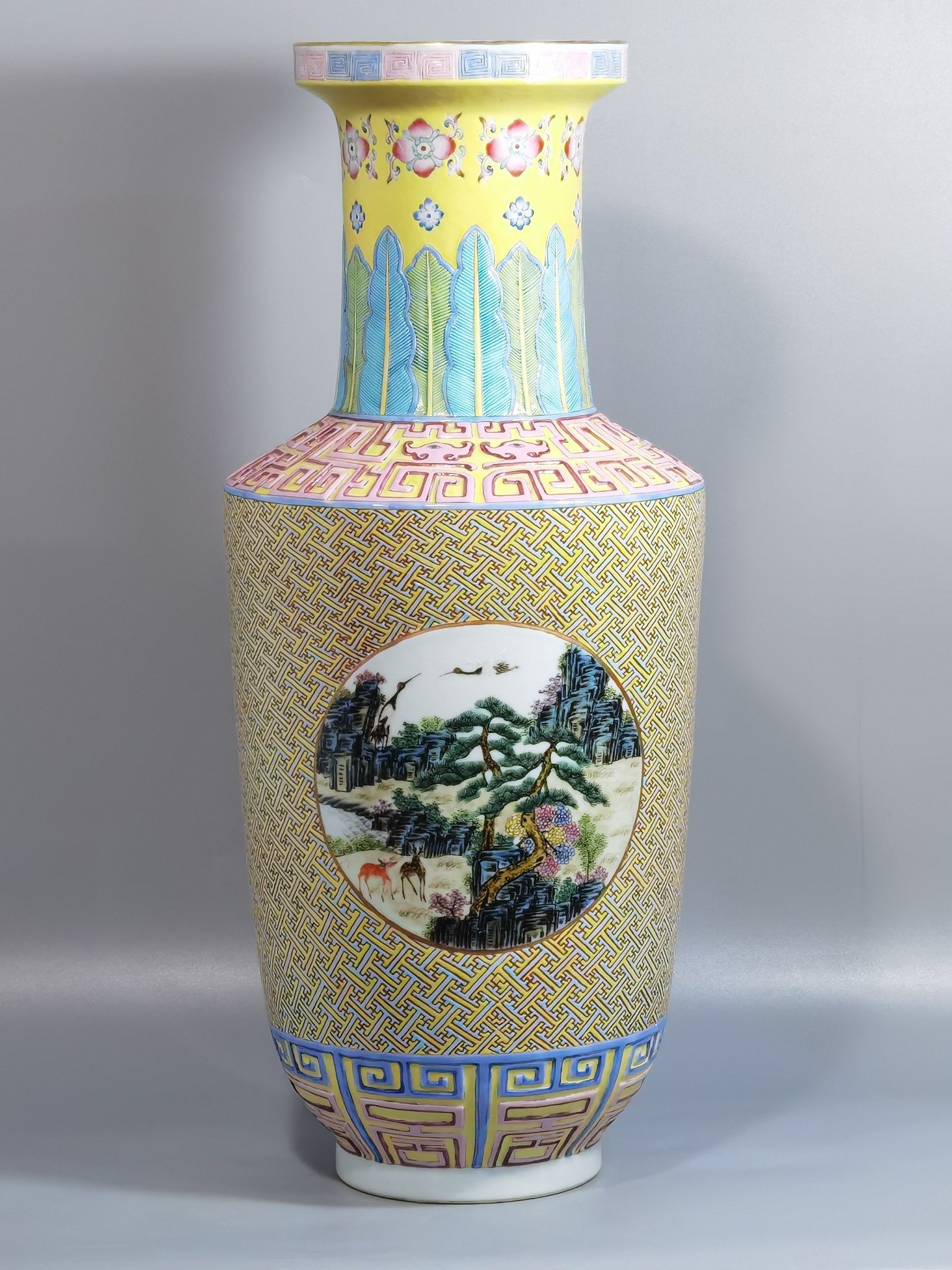 Qing Dynasty Qianlong pastel windowed deer and crane with spring stick vase