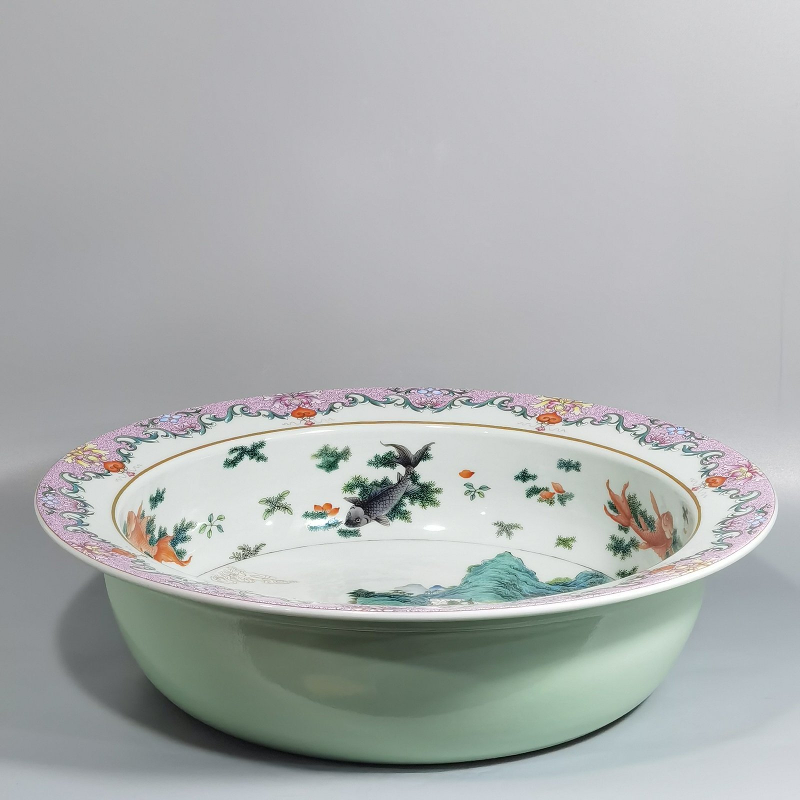 Qing Dynasty Qianlong pastel fish and algae pattern landscape and figure basin