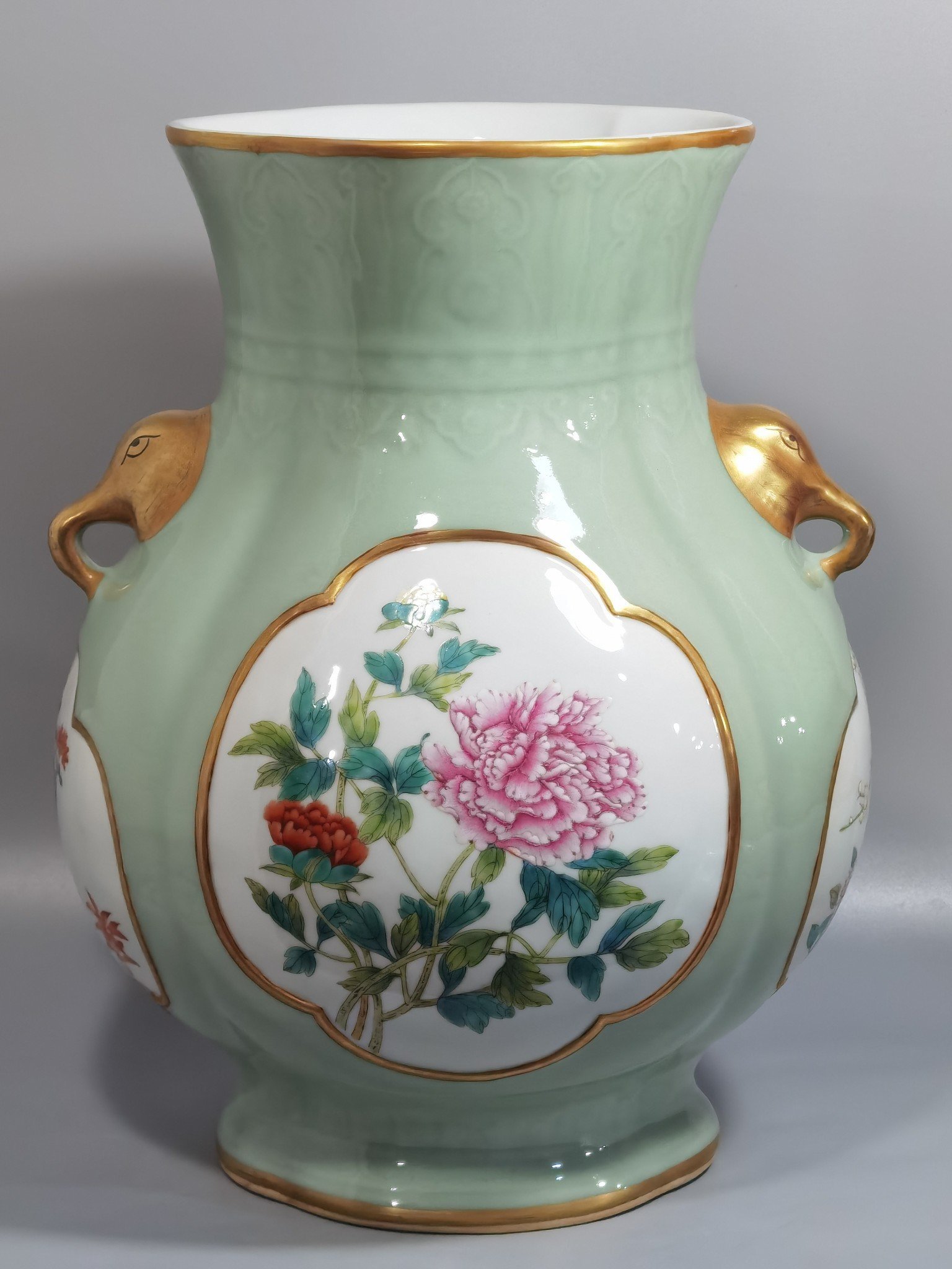 Qing Dynasty Qianlong Pale celadon-glazed haitang shaped vase with elephant-head handles