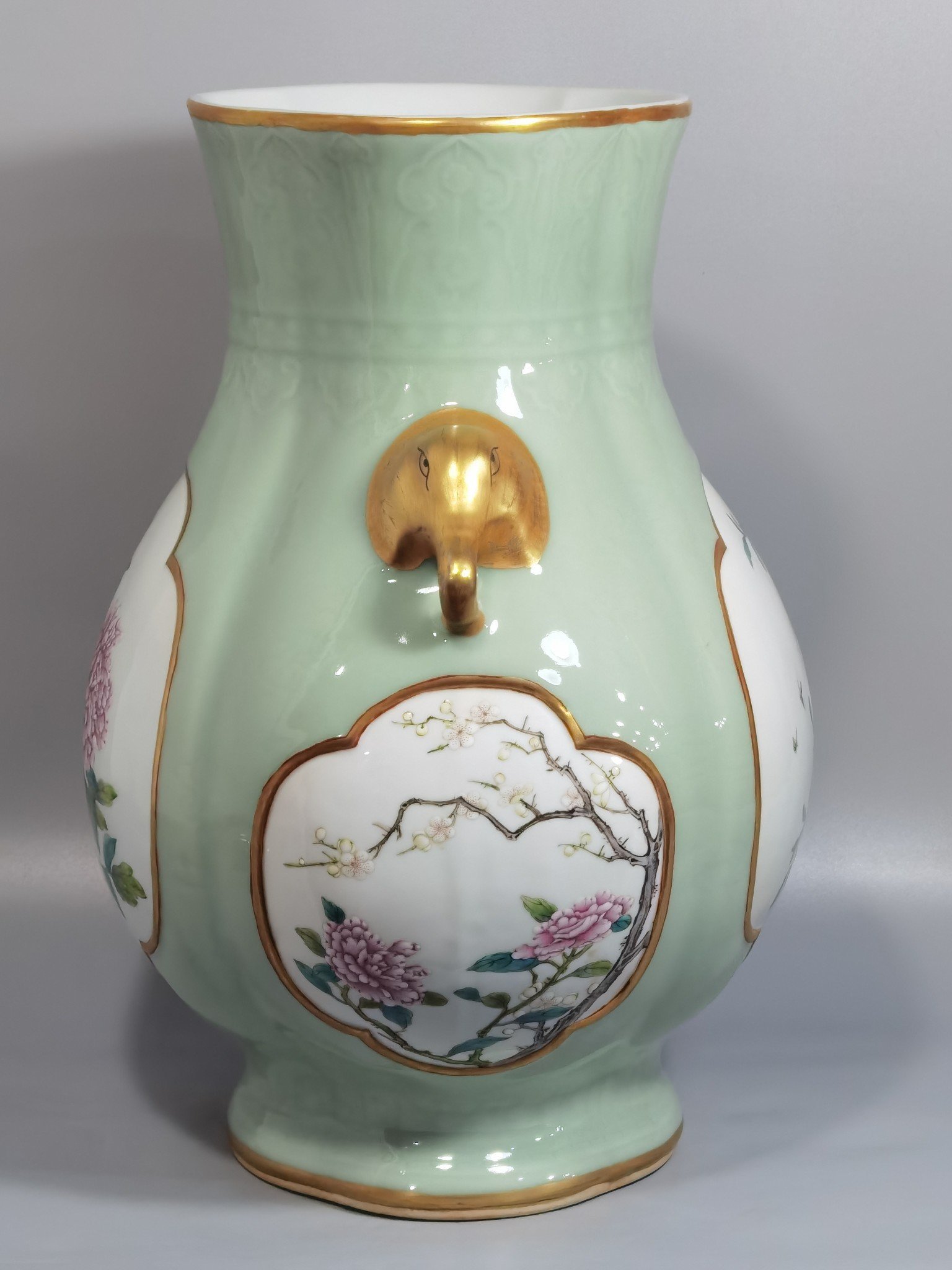 Qing Dynasty Qianlong Pale celadon-glazed haitang shaped vase with elephant-head handles