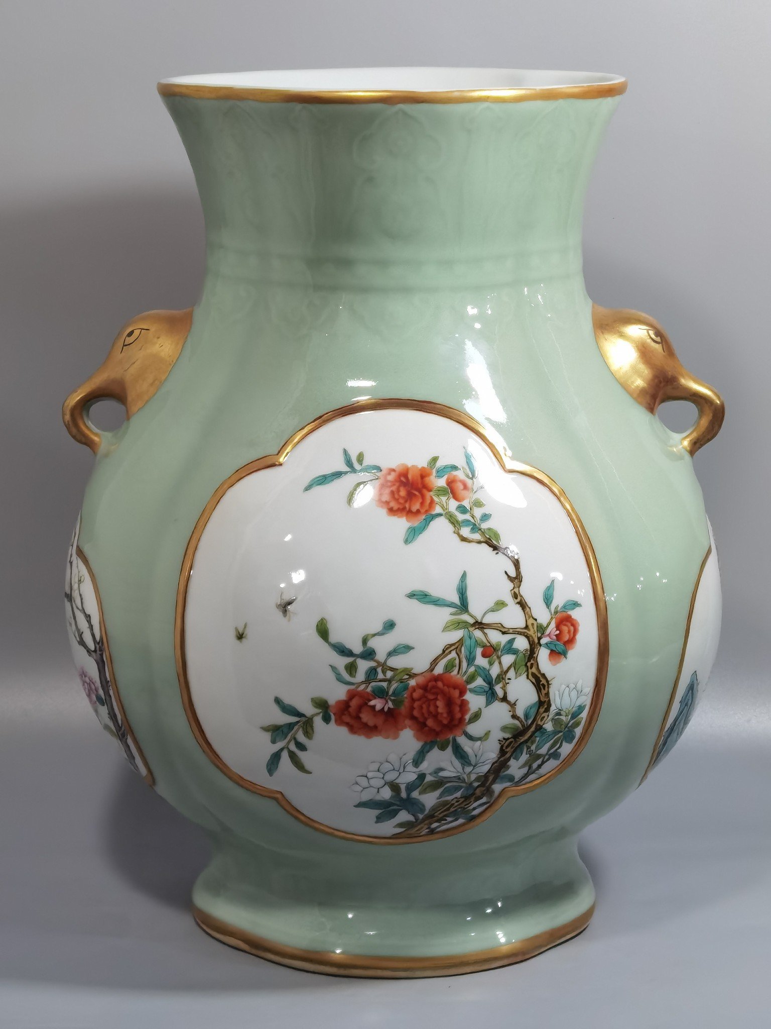 Qing Dynasty Qianlong Pale celadon-glazed haitang shaped vase with elephant-head handles