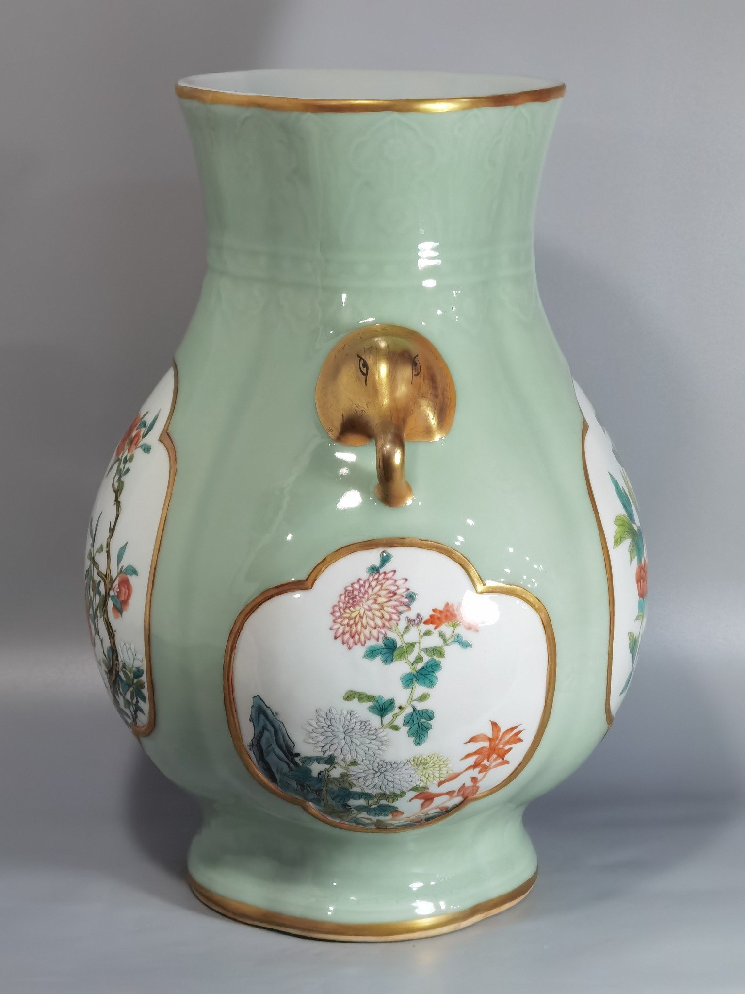 Qing Dynasty Qianlong Pale celadon-glazed haitang shaped vase with elephant-head handles