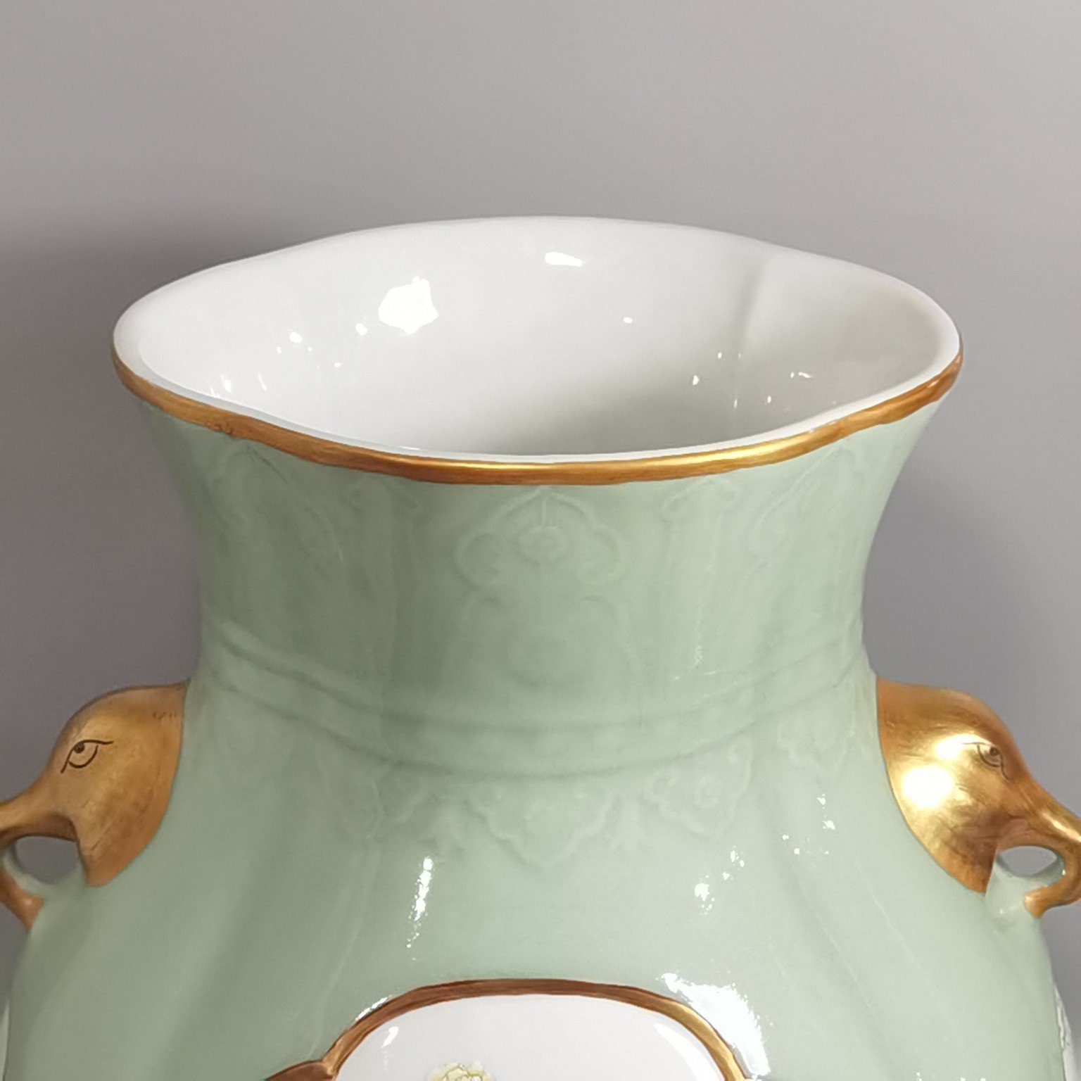 Qing Dynasty Qianlong Pale celadon-glazed haitang shaped vase with elephant-head handles