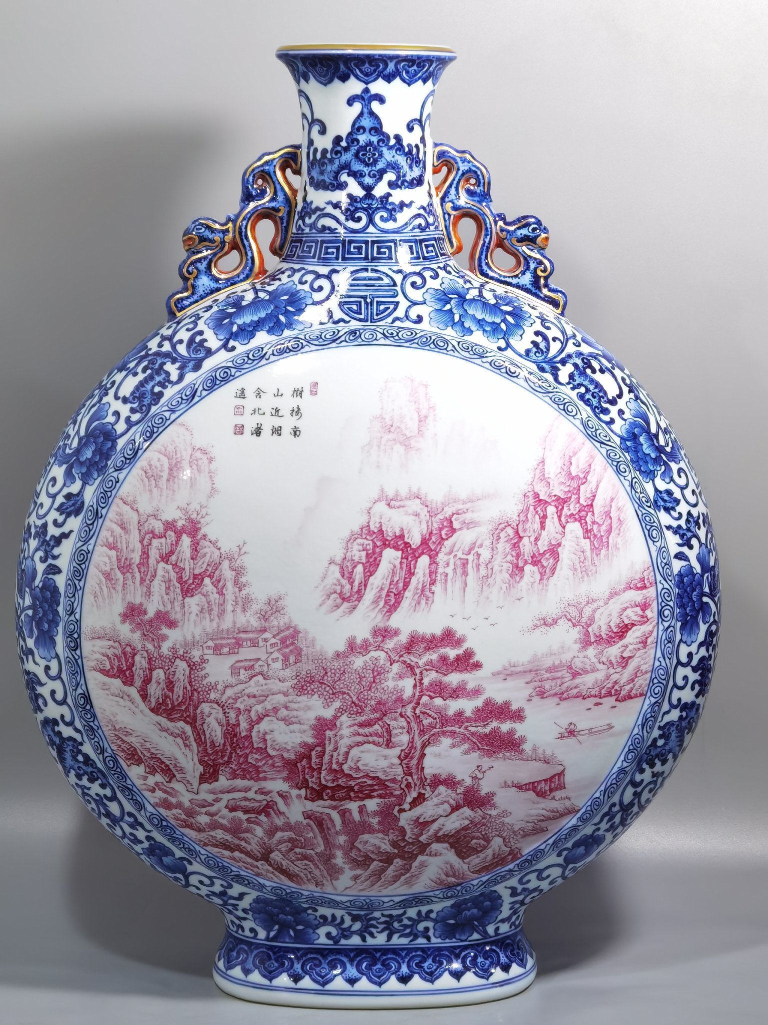 Qing Dynasty Qianlong blue and white enamel agate and red landscape figures flat bottle