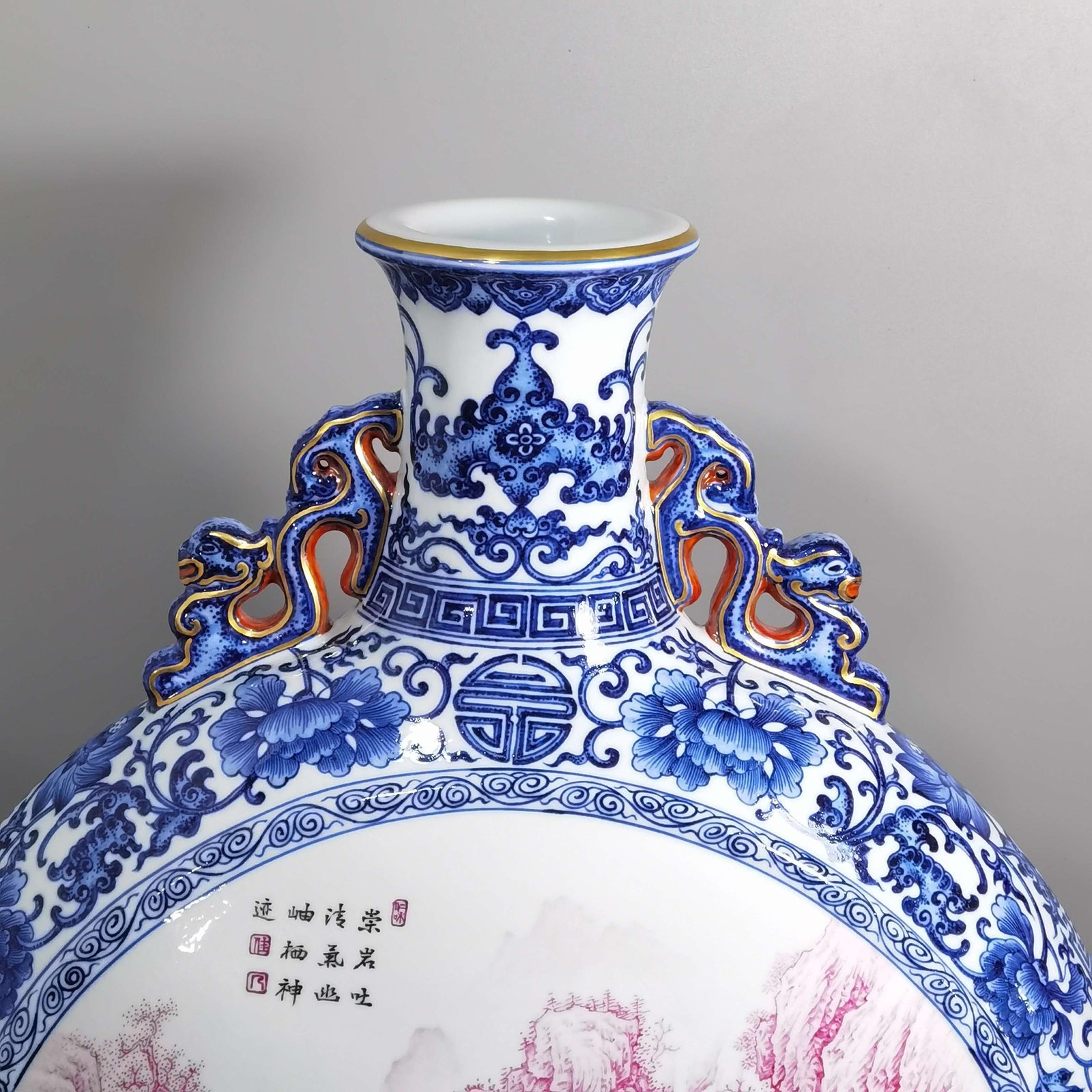 Qing Dynasty Qianlong blue and white enamel agate and red landscape figures flat bottle