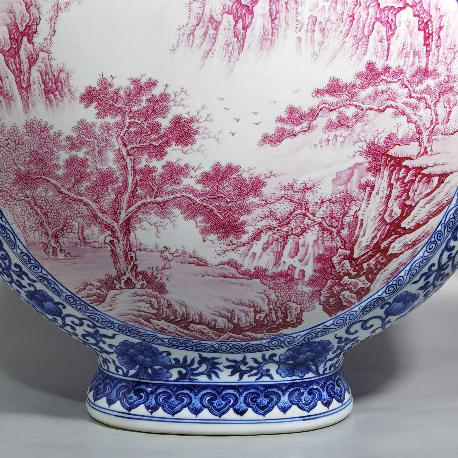 Qing Dynasty Qianlong blue and white enamel agate and red landscape figures flat bottle