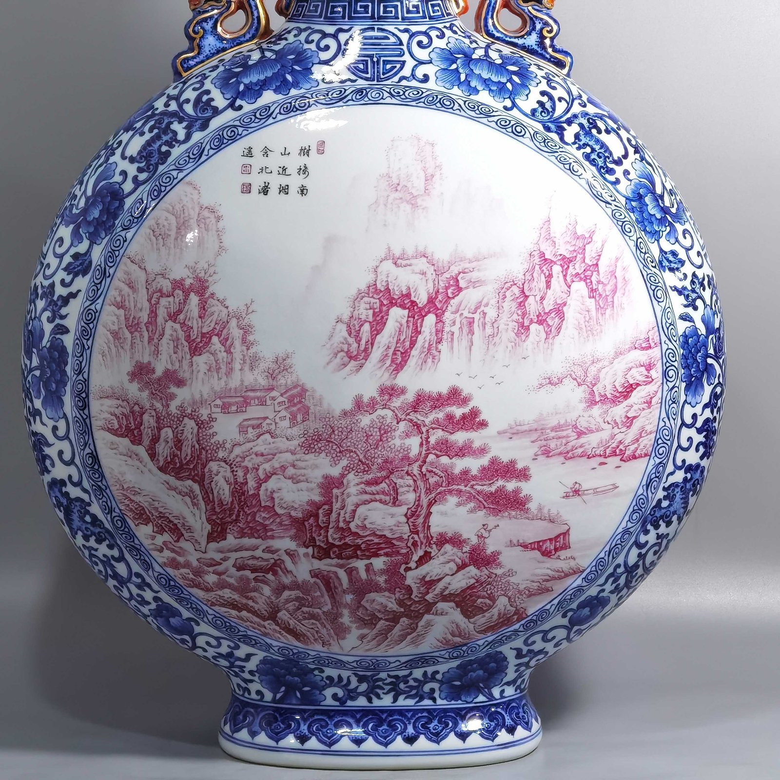 Qing Dynasty Qianlong blue and white enamel agate and red landscape figures flat bottle